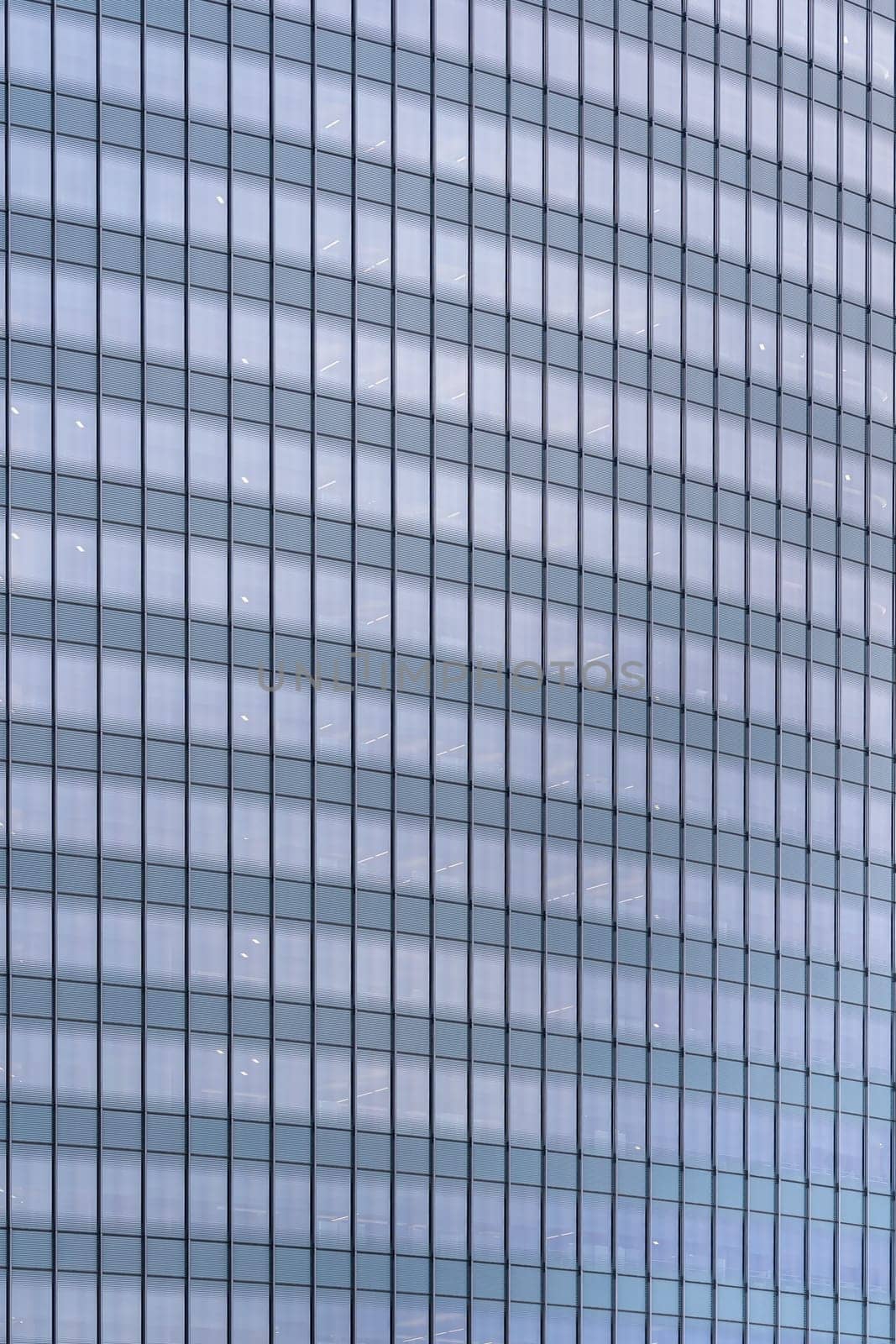 Urban abstract - window facade of business center office building with reflections and colours. Philadelphia PA USA