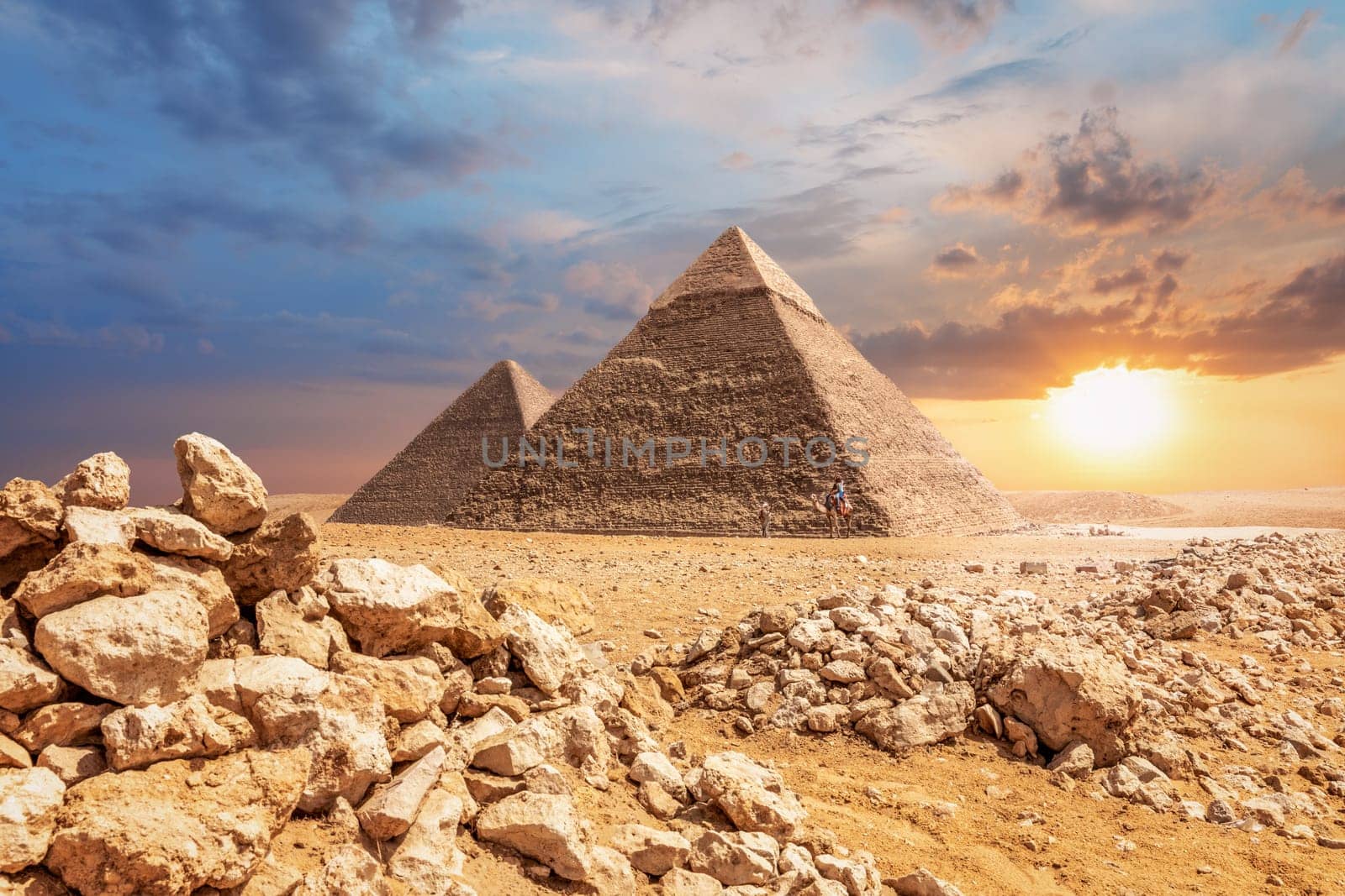 Desert sunset, beautiful view of the Pyramids of Giza.
