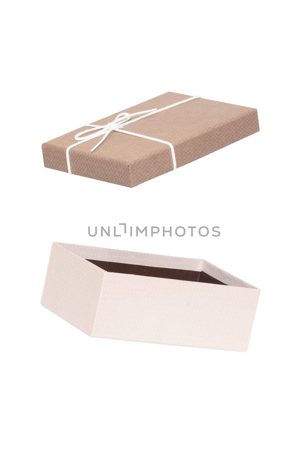 Decoration element isolated. Close-up of a open brown white present or gift box with white ribbon bow isolated on a white background. Birthday, valentine, wedding or other holidays. Macro.