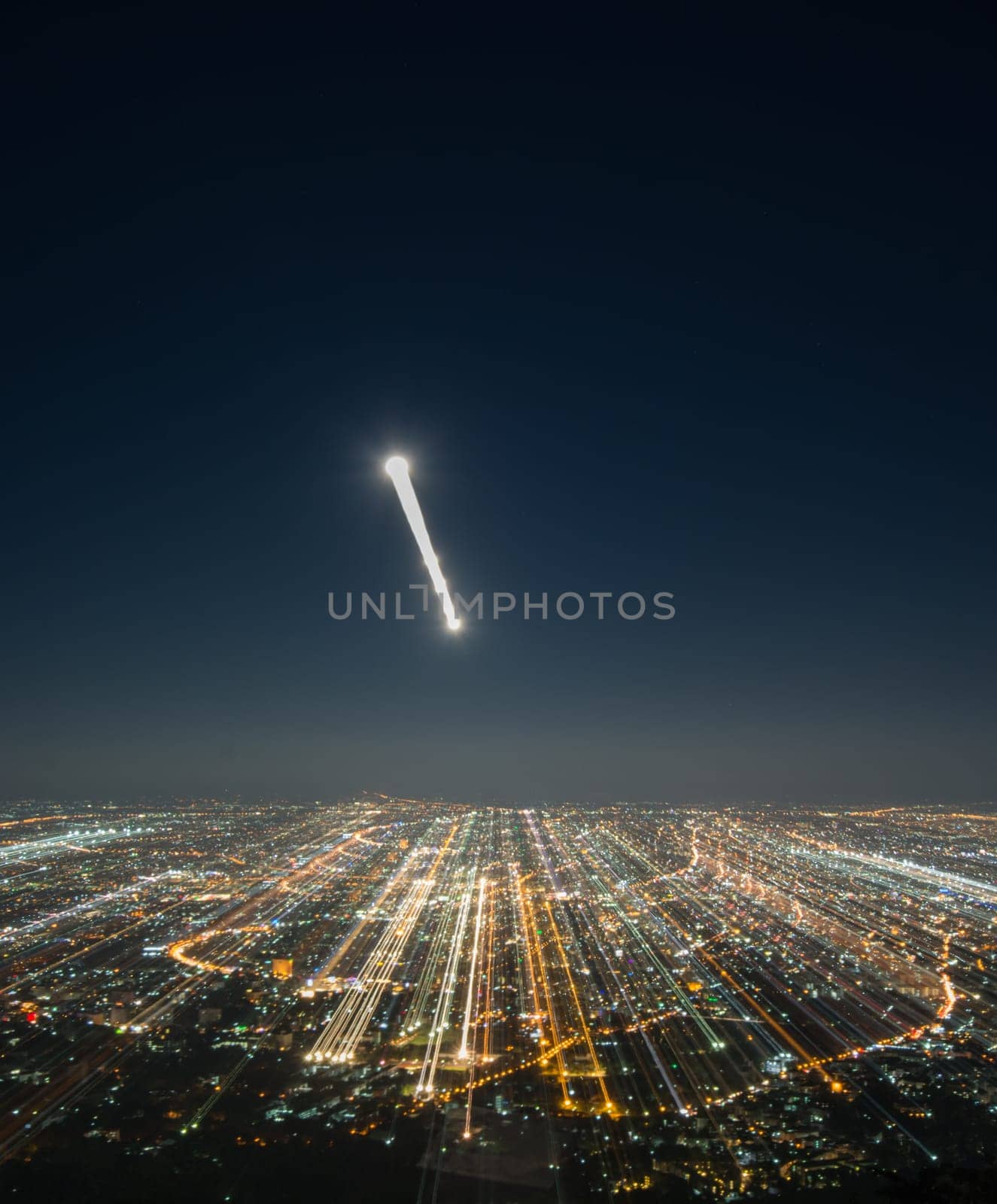 Abstract long exposure, experimental surreal photo, city and vehicle lights at night.