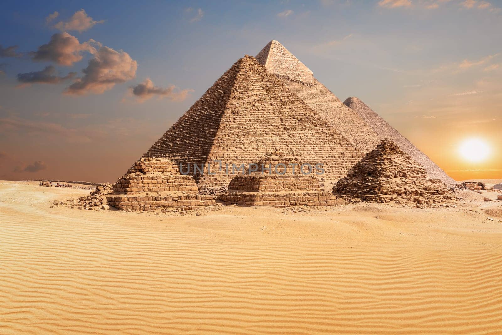 Famous Pyramids of Giza, beautiful sunset photo.
