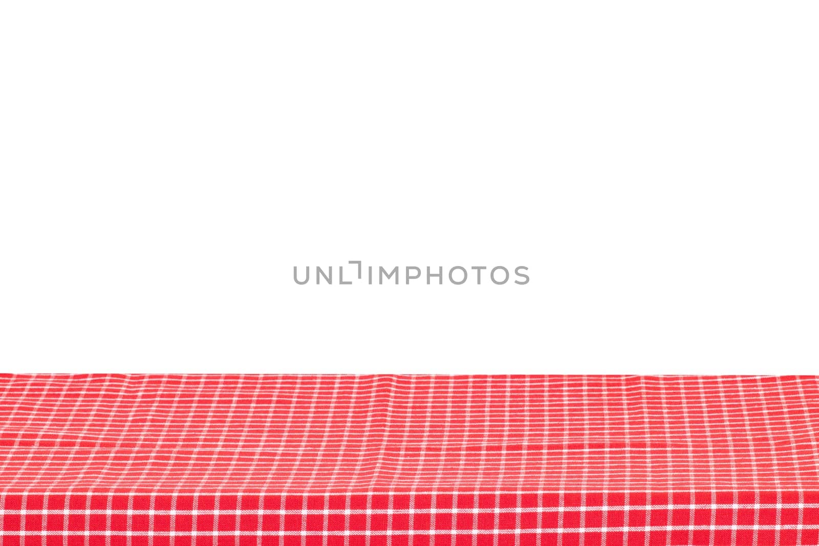 Empty table background. Empty wooden deck table covered with red white checkered tablecloth isolated on a white background. Space for your food and product display montage.