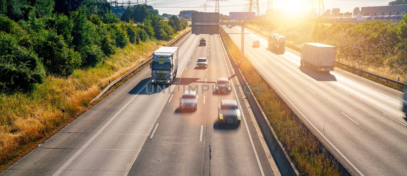 Lots of Trucks and cars on a Highway - transportation concept