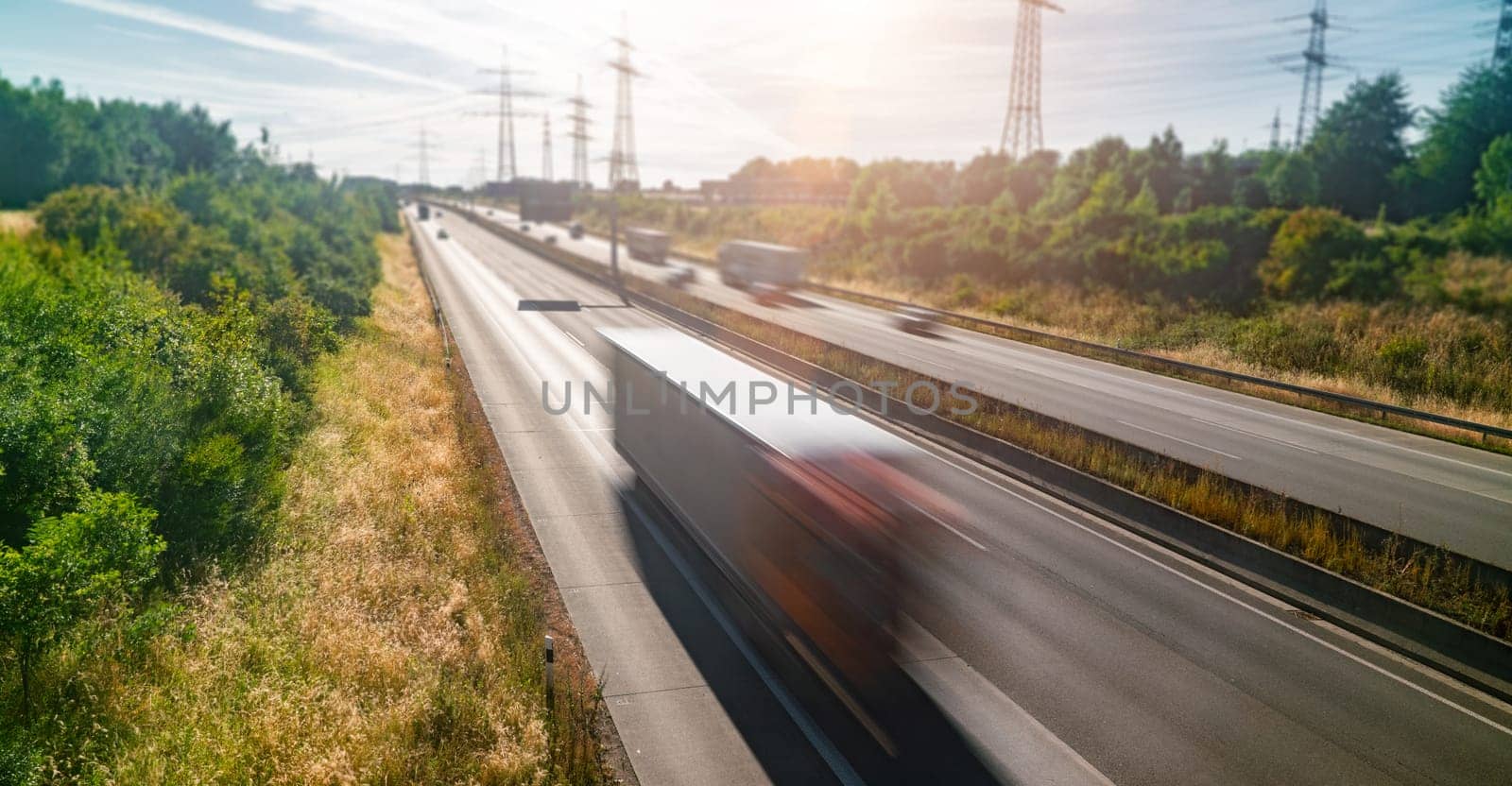 Lots of Trucks and cars on a Highway - transportation concept