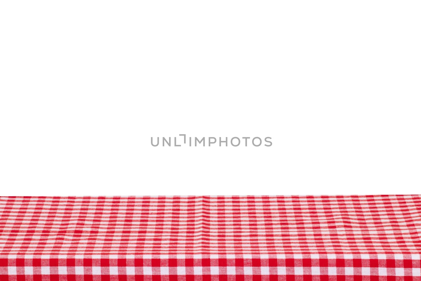 Empty table background. Empty wooden deck table covered with red white checkered tablecloth isolated on a white background. Space for your food and product display montage.
