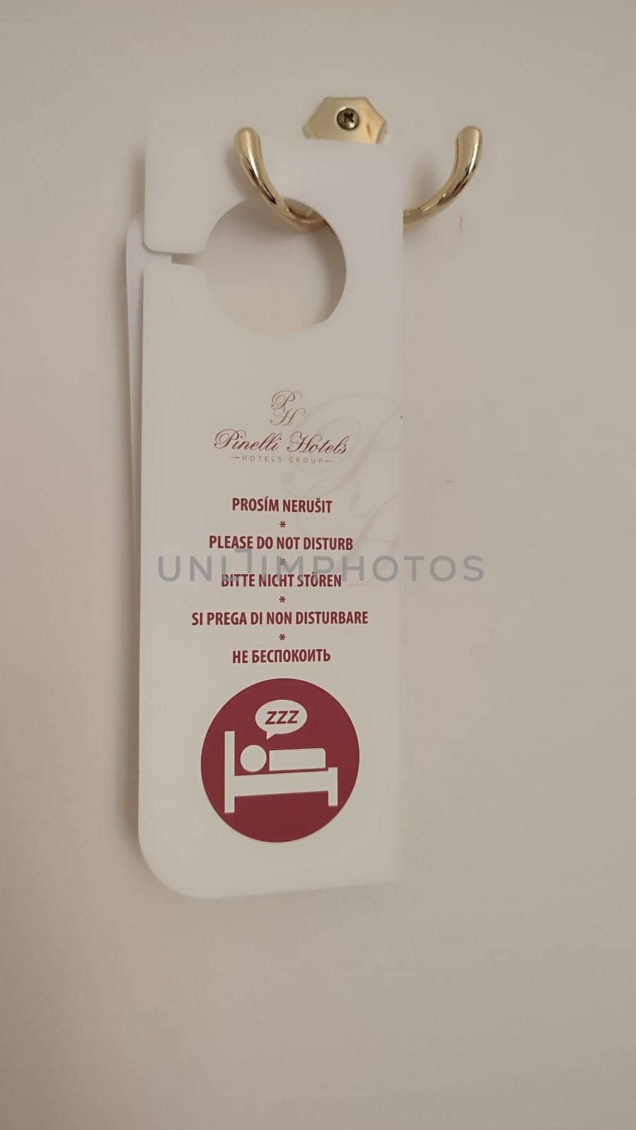 October 15 2024 Prague Czech Republic Europe Room service sign clean room simbol logo door handle bad white paper letter. High quality photo