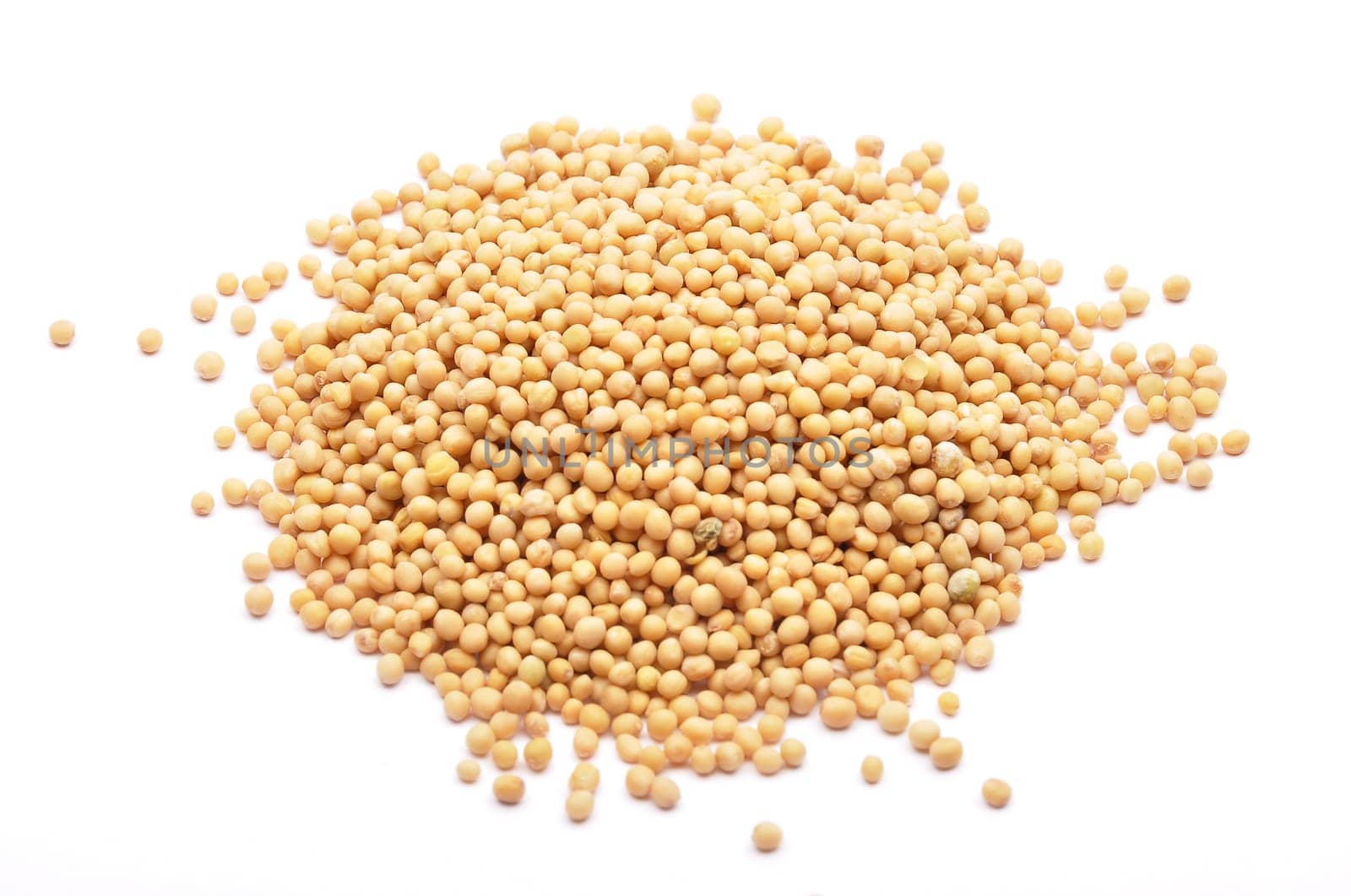 Mustard seeds on white background