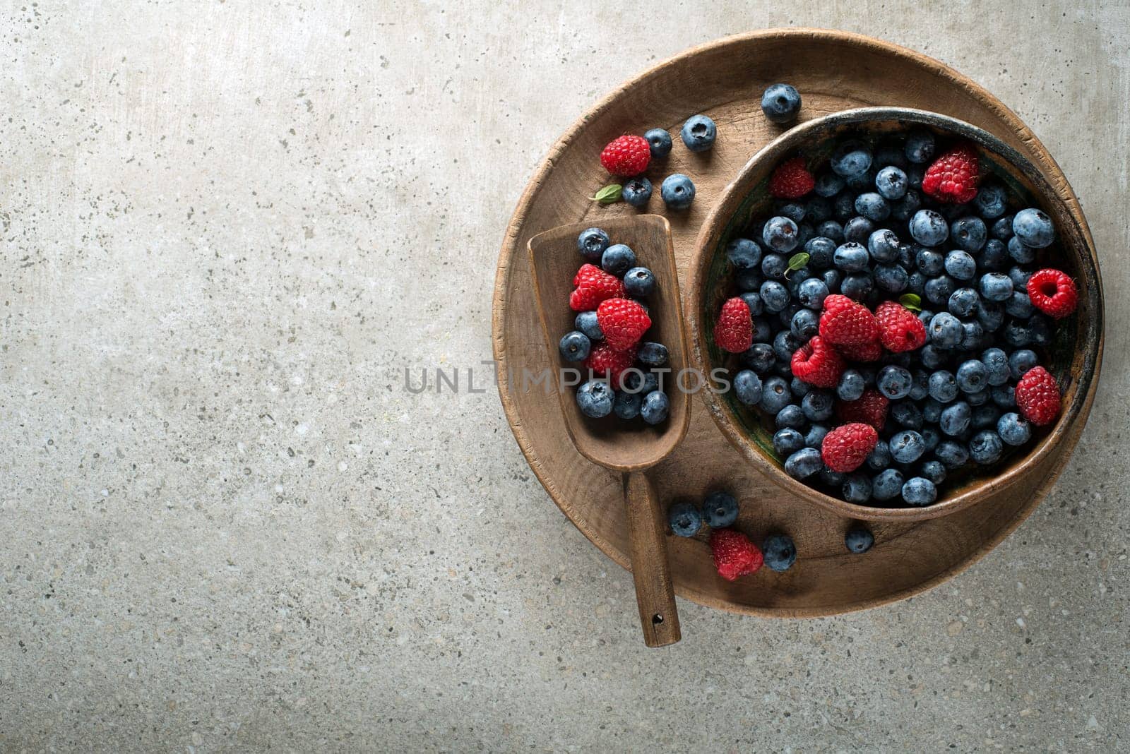 Berries overhead closeup colorful assorted mix of blueberry and raspberry