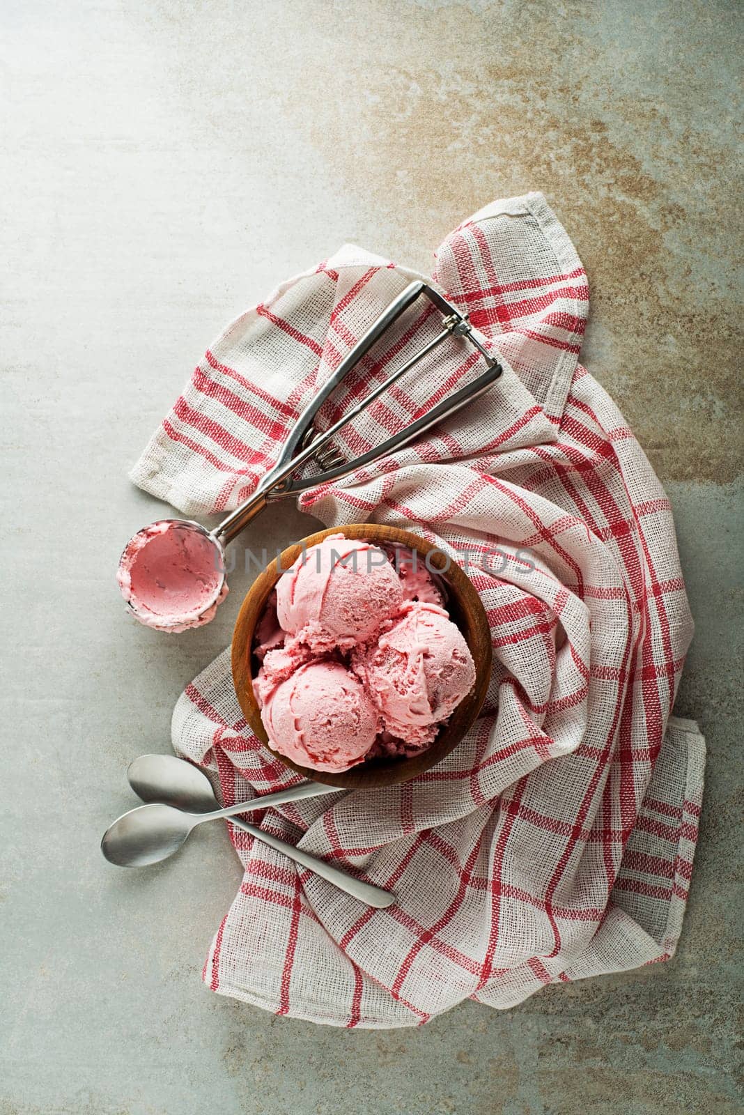 Fresh of soft icre cream or frozen yoghurt with barry fruit flavours. Fruit ice cream scoop, scooped with a utensil