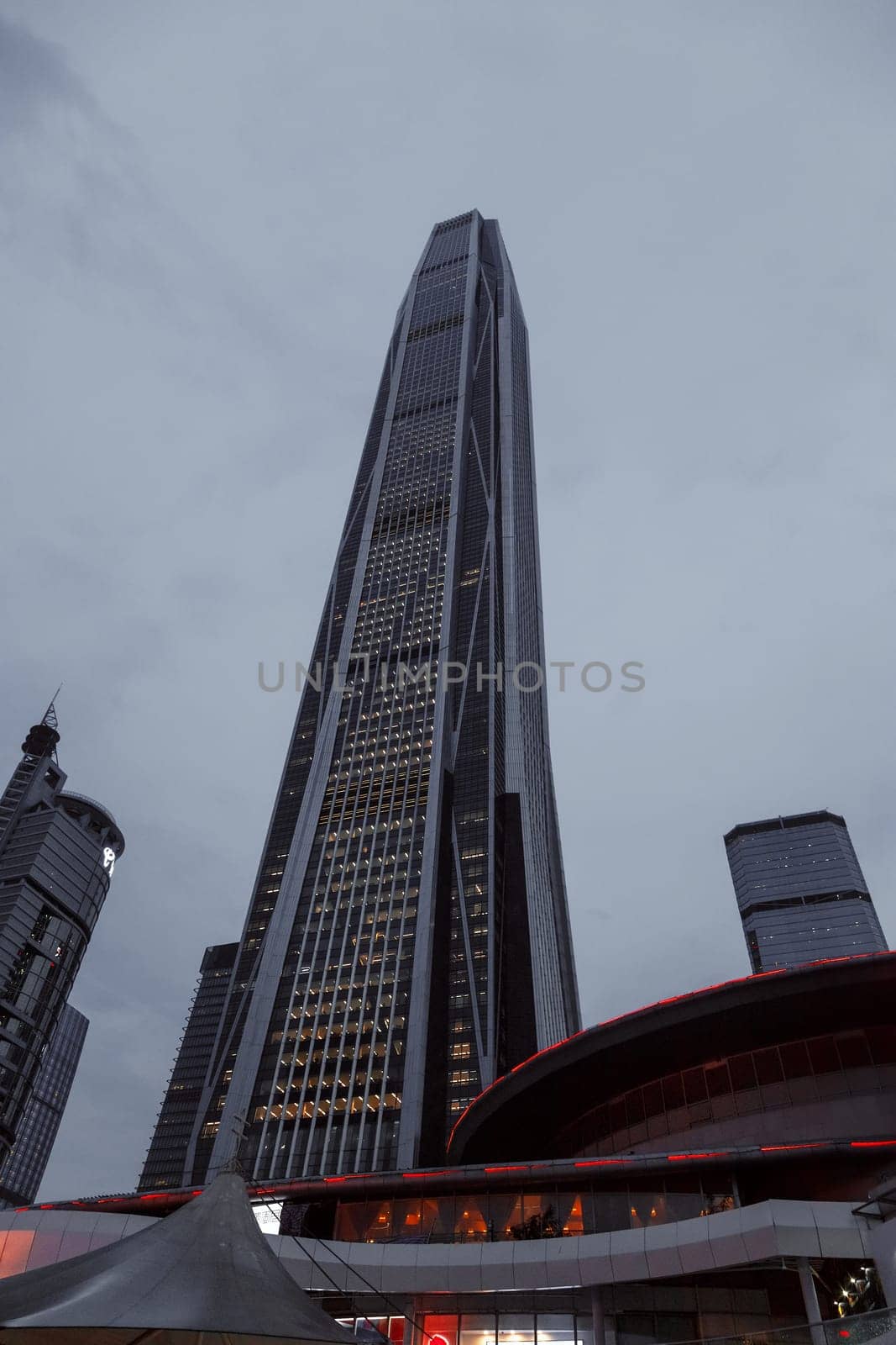 Skyscrapers in Shenzhen, China against a cloudy sky , modern building
