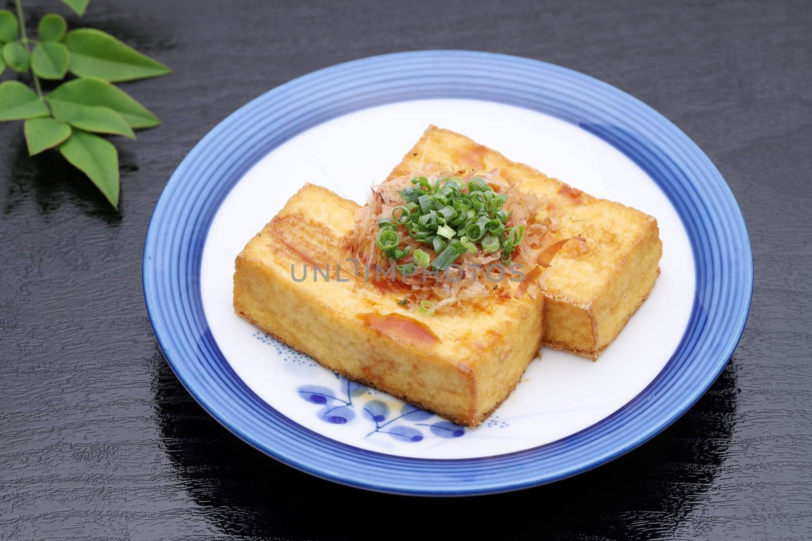 Japanese food, Age tofu cuisine on black background
