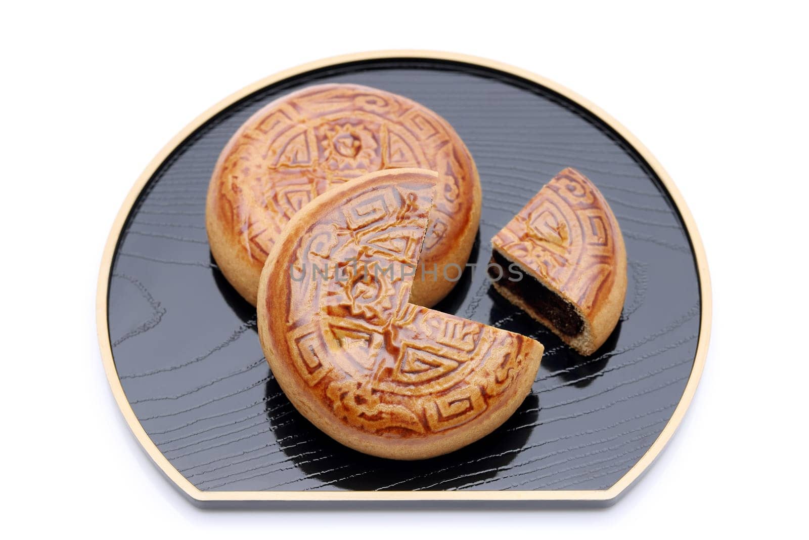 Traditional mooncake for Chinese mid autumn festival, on white background