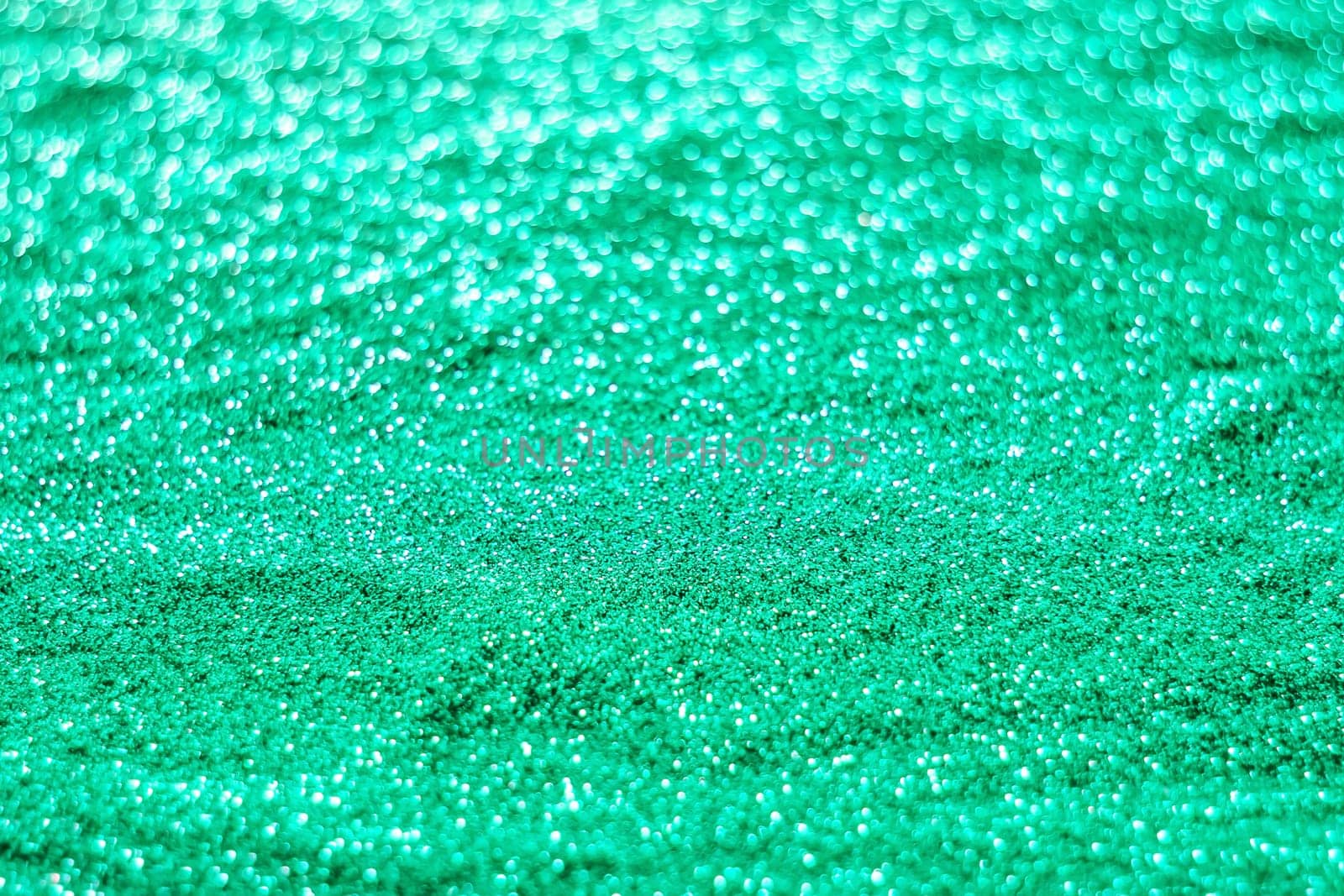 Glitter light abstract cyans bokeh christmas light blurred background