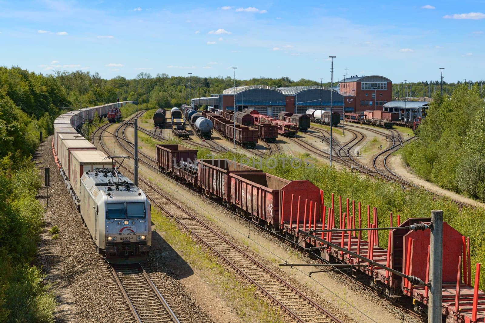 Munich, Germany - July 10, 2019: Motive power maintenance depot of German freight railway company with moving rolling stock