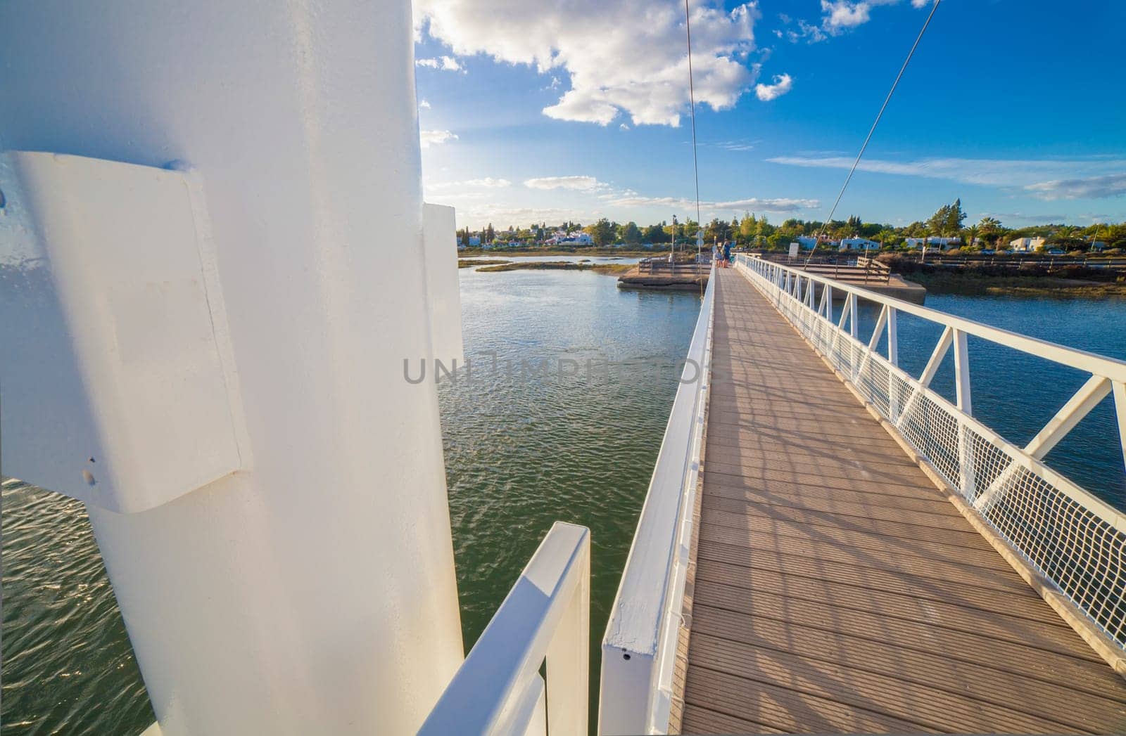 Tavira, Portugal - October 14th, 2018: Tavira Island pedestrian drawbridge, built to access by land to Barril Beach, Algarve, Portugal