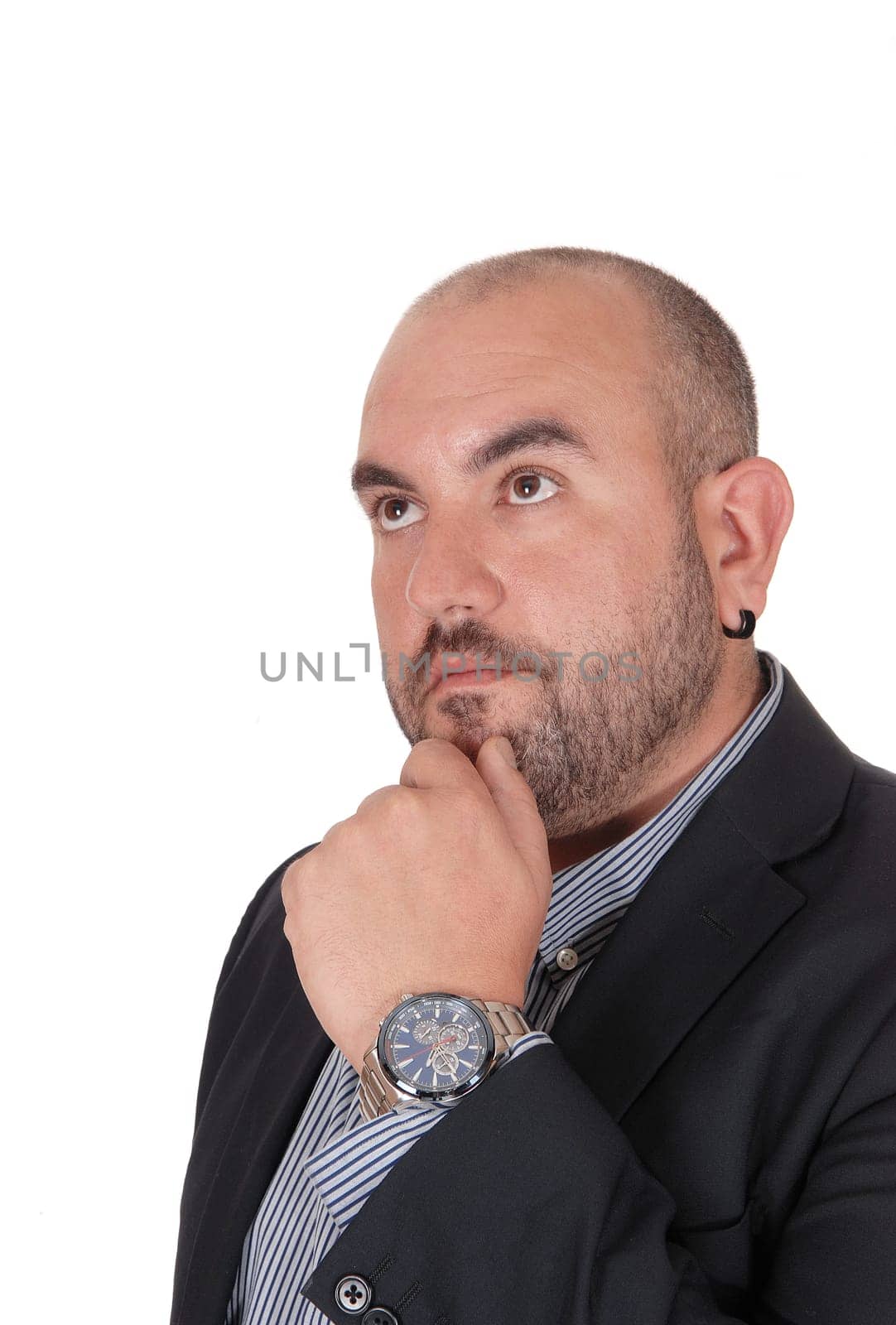 A close up image of an Hispanic middle age man with his hand on his.chin and thinking hand, looking up, isolated for white background.
