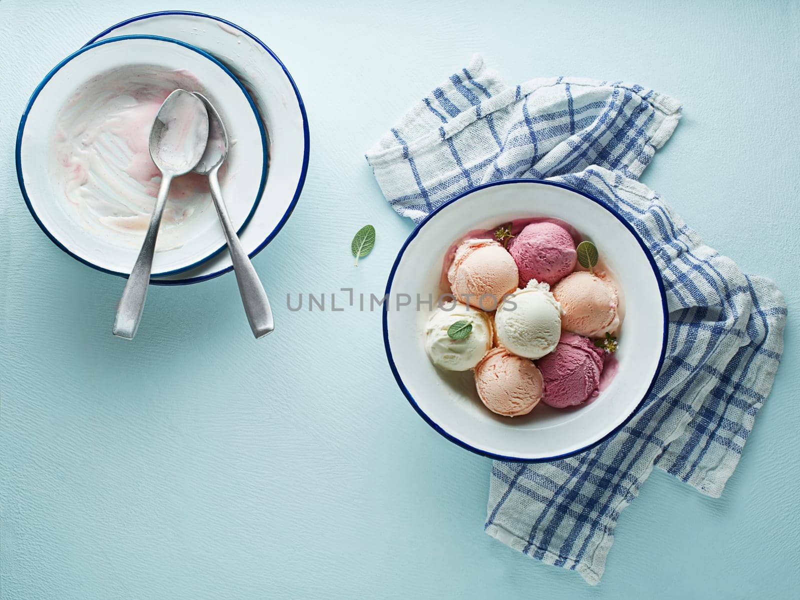 Set of soft ice cream scoops or frozen yoghurt of different colors and flavours with berries and fruits