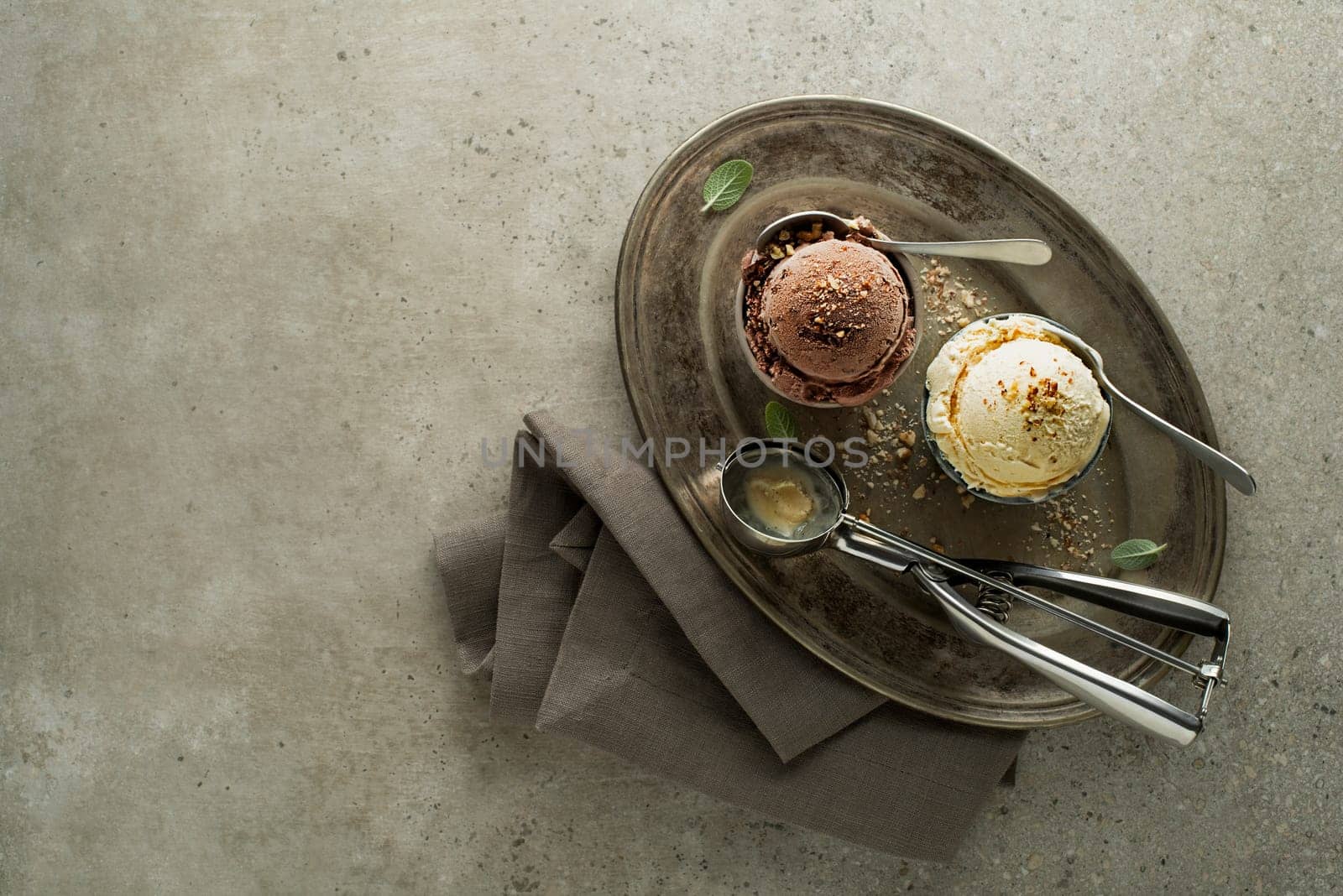 Set of ice cream scoops with chocolate and vanilla flavours