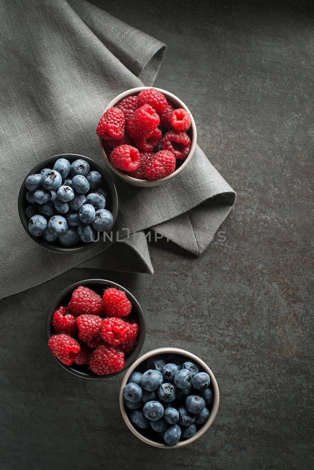 Berries overhead closeup colorful assorted mix of blueberry and raspberry