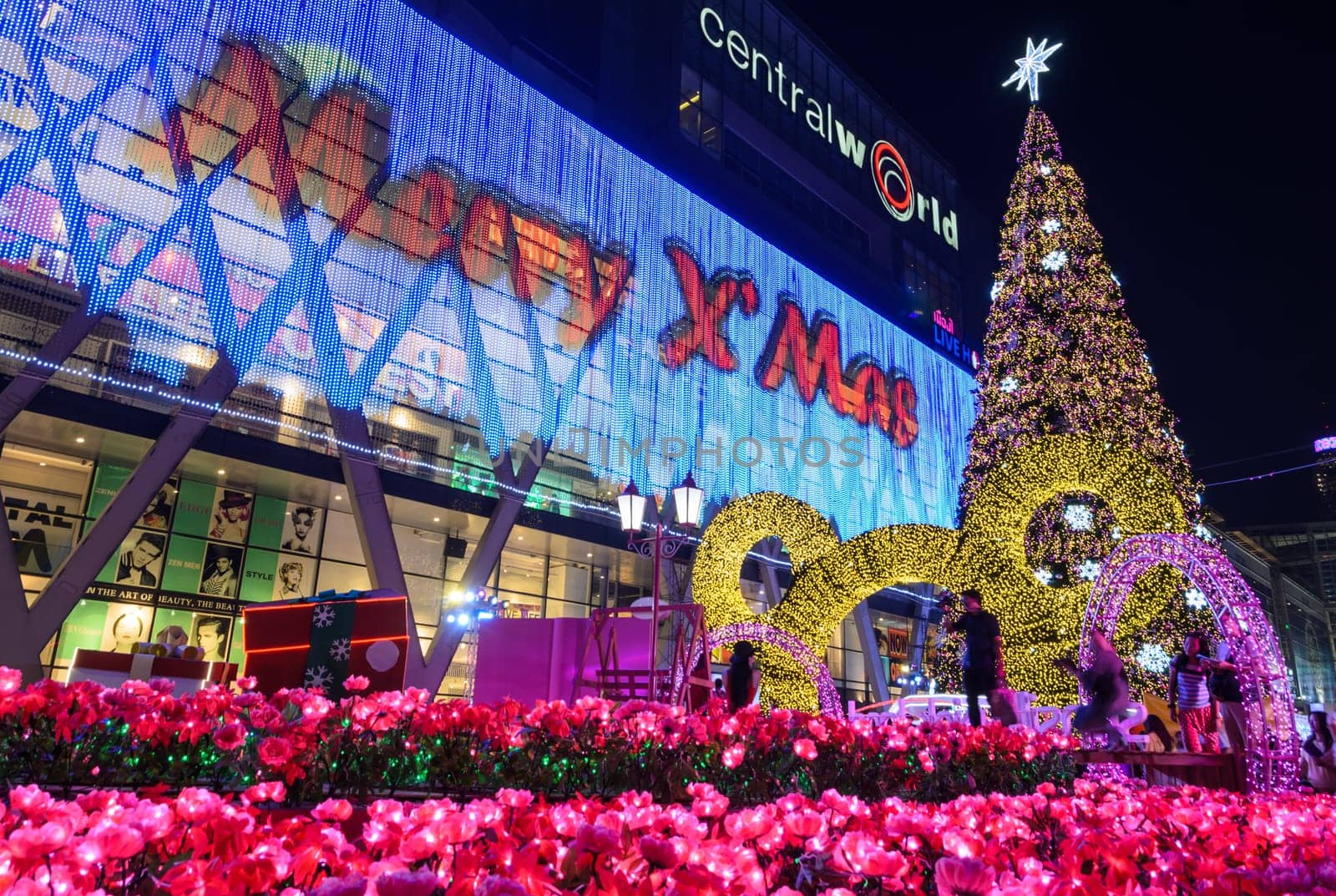BANGKOK, THAILAND - DECEMBER 21, 2015 : Night illumination of Christmas and New Year celebration 2016 at Central World shopping mall, Ratchaprasong intersection in Bangkok, Thailand. Decorated in concept of Disneyland fairy tale
