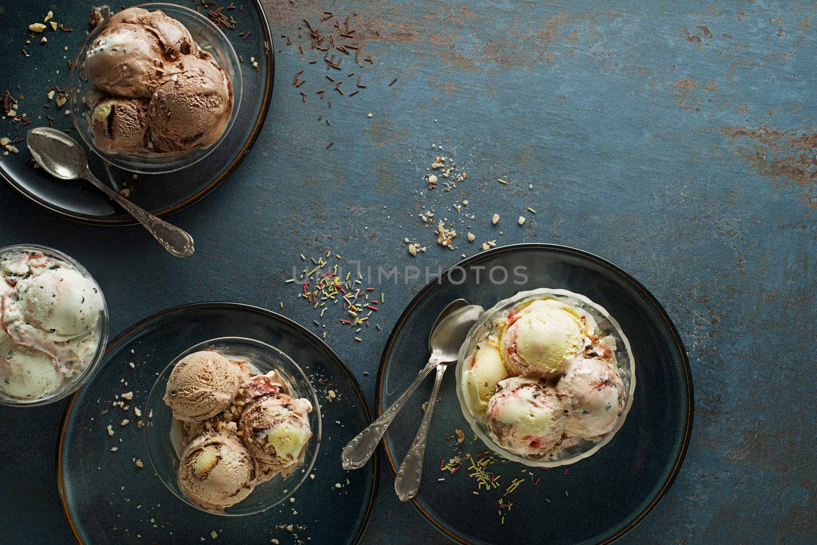 Variety of ice cream scoops with chocolate vanilla and fruity flavor