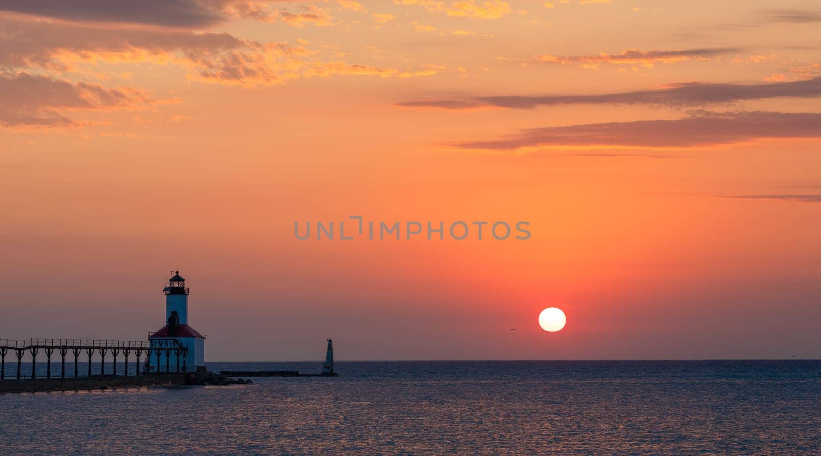 The Michigan City Breakwater Lighthouse, in the State of Indiana USA, as seen at Sunset