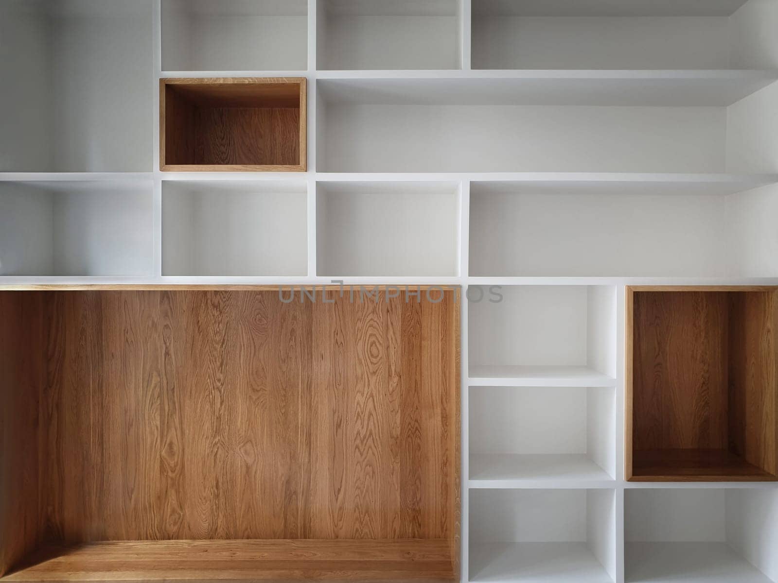 Empty closet shelves background. Modern wooden wardrobe boxes, beautiful white and brown interior design combination, abstract shape and patterns.