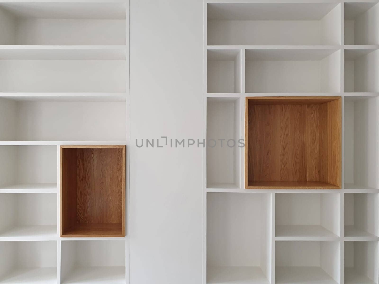 Empty closet shelves background. Modern wooden wardrobe boxes, beautiful white and brown interior design combination, abstract shape and patterns.