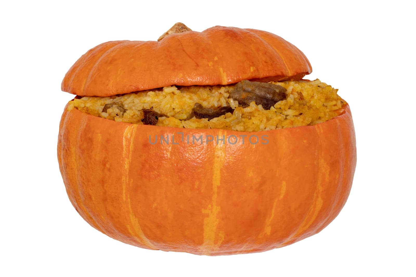 Roasted pumpkin. Close-up of baked whole pumpkin stuffed with roasted rice pot made from rice, onions, carrots, garlic, pumpkin and beef isolated on a white background.