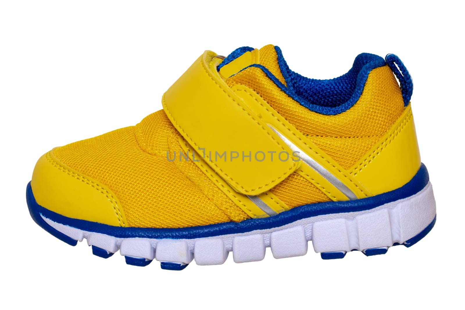 Child shoe fashion. Close-up of one yellow blue child sneaker or sport shoe isolated on a white background. Elegant and trendy shoes for girls. Macro.