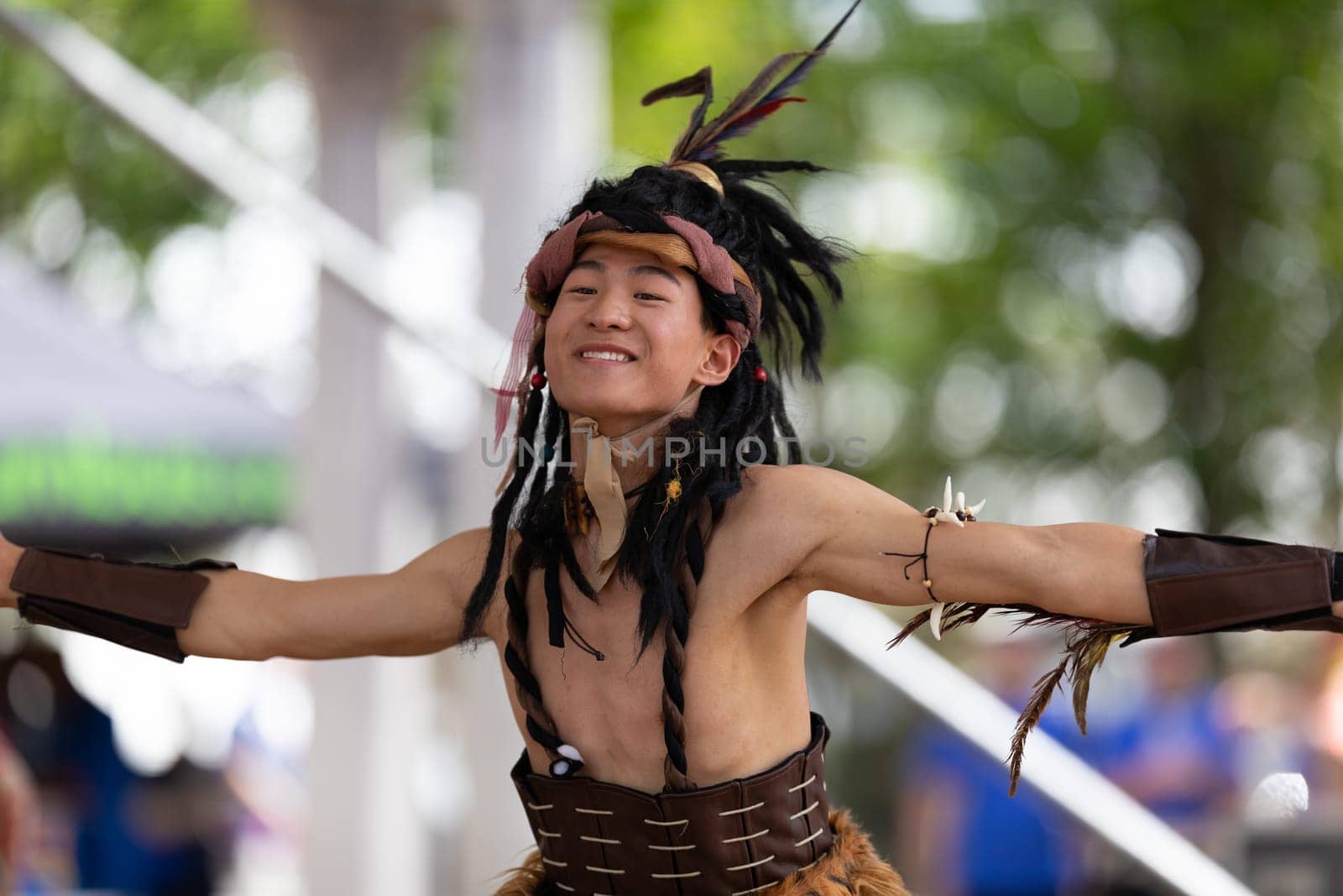 Columbus, Ohio, USA - May 26, 2019: Columbus Asian Festival, Franklin Park, Chinese Dancers wearing traditional clothing performing traditional dances.