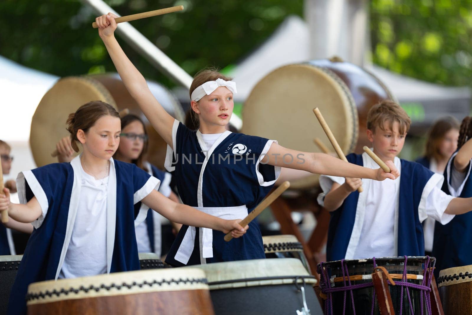 Columbus, Ohio, USA - May 26, 2019: Columbus Asian Festival, Franklin Park, Boy and girls wearing traditional japanese clothing, performing Taiko japanese drumming