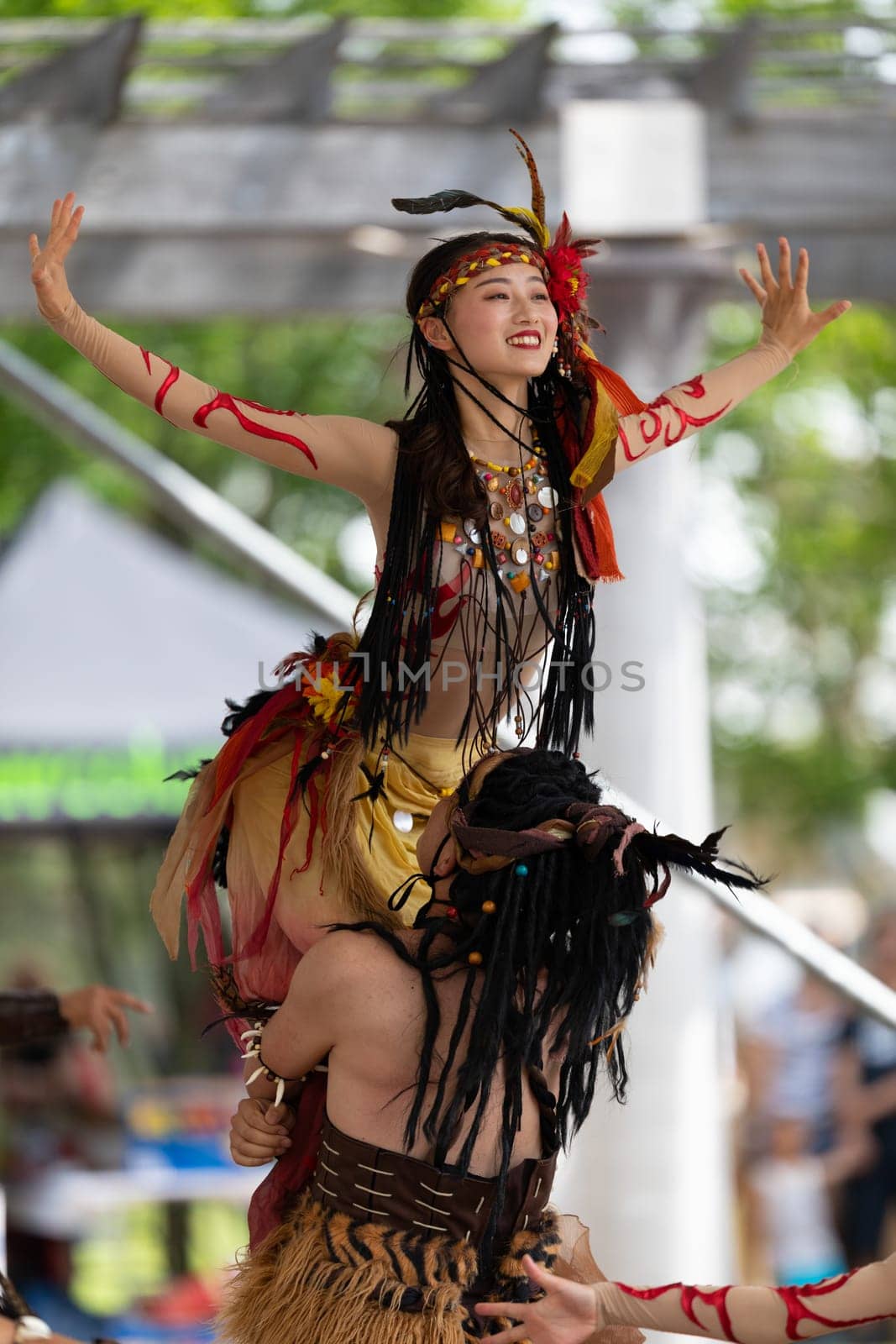Columbus, Ohio, USA - May 26, 2019: Columbus Asian Festival, Franklin Park, Chinese Dancers wearing traditional clothing performing traditional dances.
