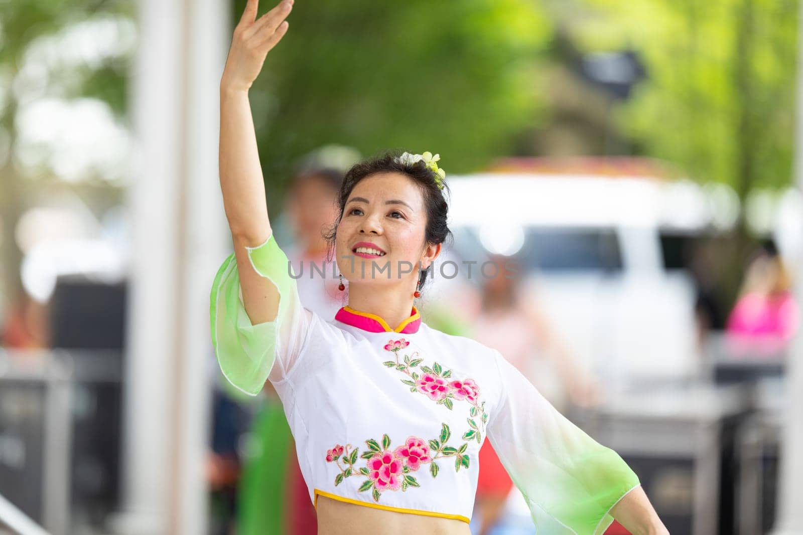 Columbus, Ohio, USA - May 26, 2019: Columbus Asian Festival, Franklin Park, Chinese Dancers wearing traditional chinese clothing, performing a display of chinese traditional dancing