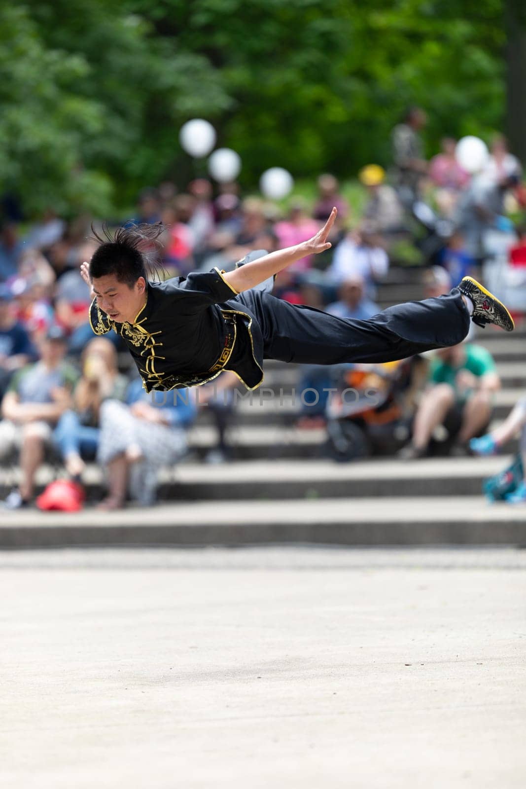 Columbus, Ohio, USA - May 26, 2019: Columbus Asian Festival, Franklin Park, Chinese man wearing traditional clothing displaying his martial arts skill