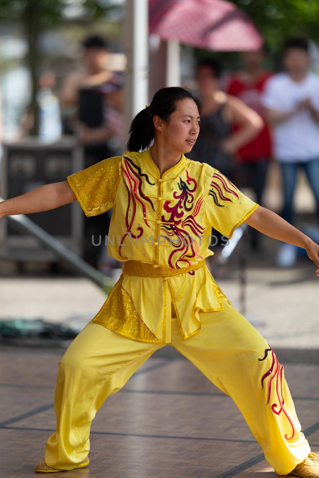 Columbus, Ohio, USA - May 26, 2019: Columbus Asian Festival, Chinese Men and women performing a display of shaolin martial arts in the amphitheater at Franklin Park