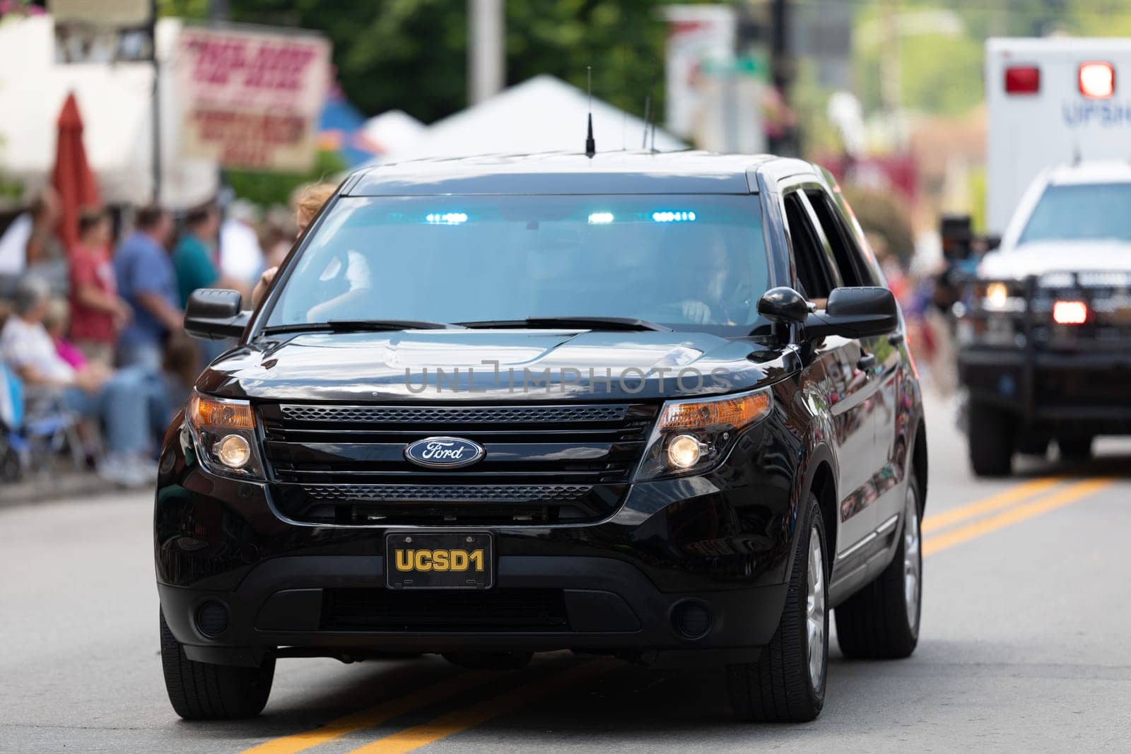 Buckhannon, West Virginia, USA - May 18, 2019: Strawberry Festival, Ford, Explorer, Police patrol going down main street during the parade