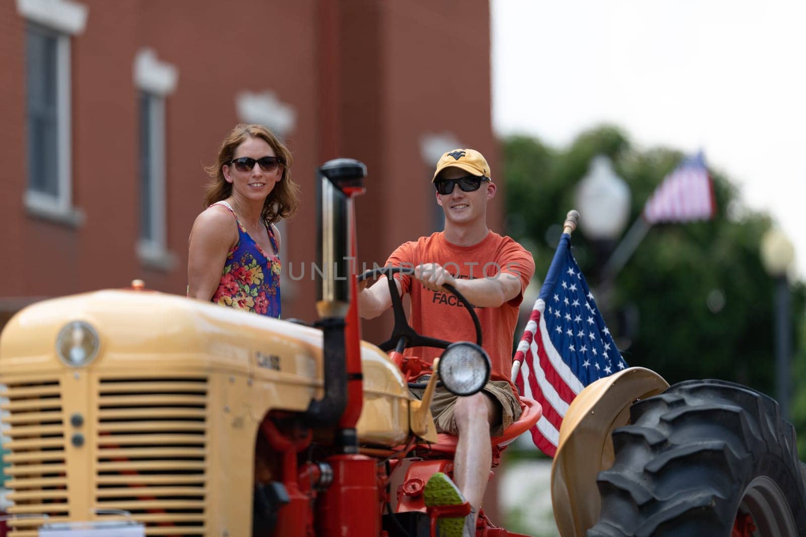 Buckhannon, West Virginia, USA - May 18, 2019: Strawberry Festival, Old Tractors being driven along Main Street during the parade