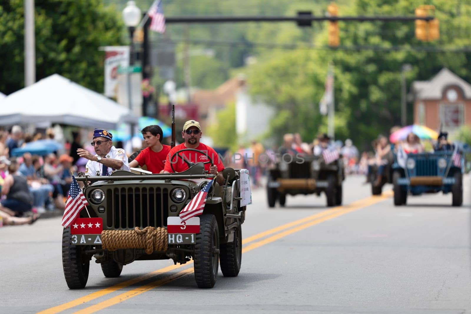 Buckhannon, West Virginia, USA - May 18, 2019: Strawberry Festival, Military veterans of the United States being driven on jeeps during the parade