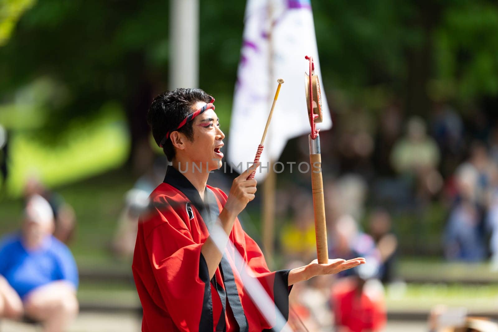 Columbus, Ohio, USA - May 26, 2019: Columbus Asian Festival, Members of Takarabune dance group from Japan, wearing traditional clothing performing traditional dances at the Amphitheater in the Franklin Park.