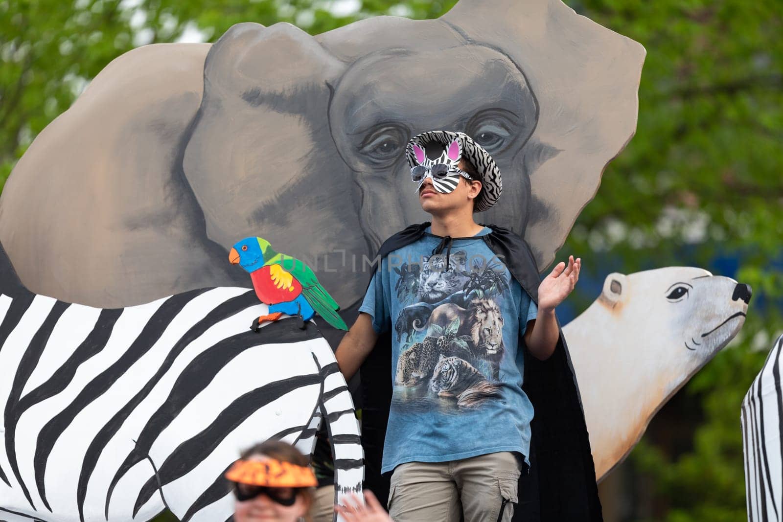Louisville, Kentucky, USA - May 2, 2019: The Pegasus Parade, People holding signs promoting nature conservation during the parade