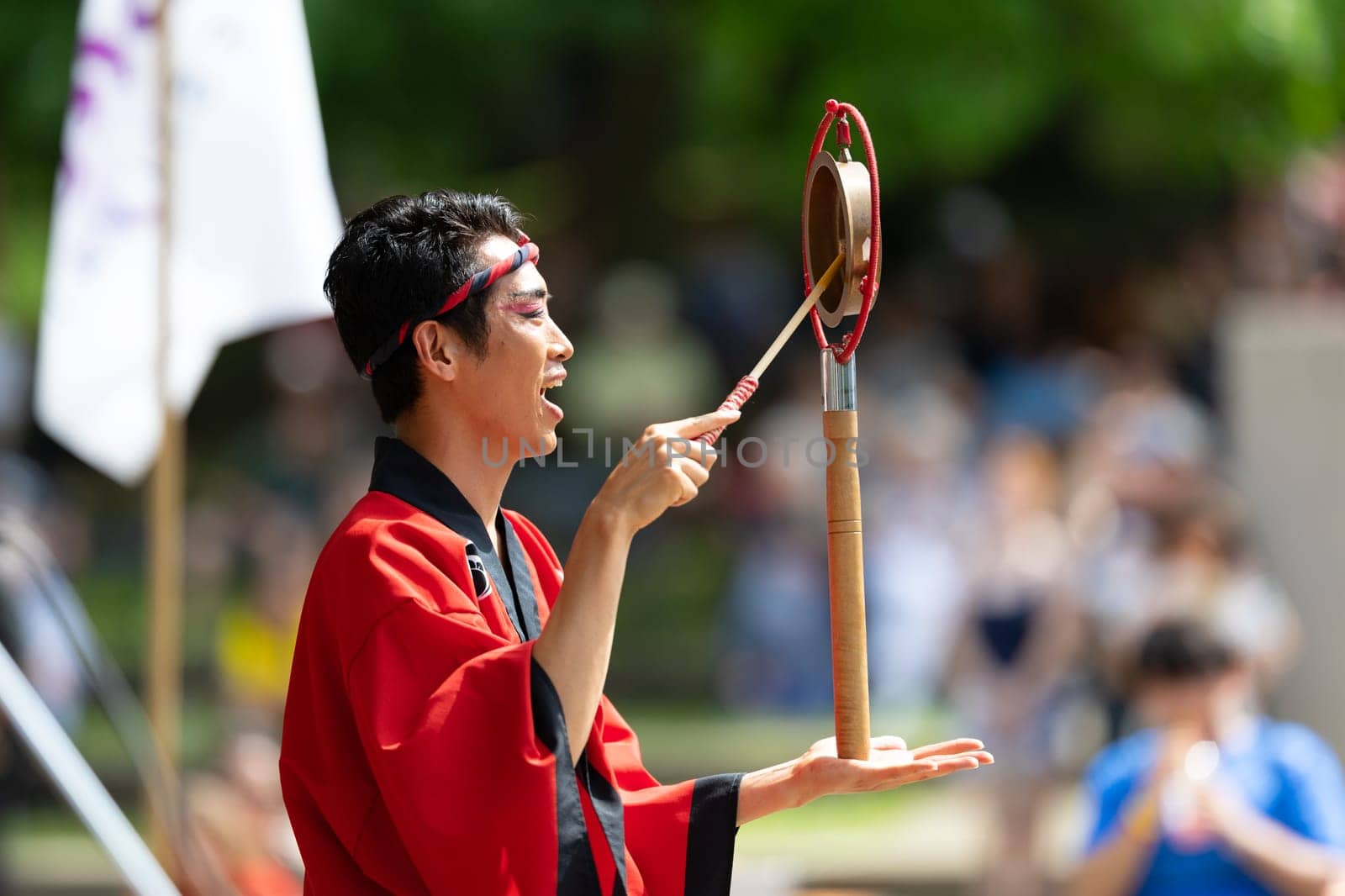 Columbus, Ohio, USA - May 26, 2019: Columbus Asian Festival, Members of Takarabune dance group from Japan, wearing traditional clothing performing traditional dances at the Amphitheater in the Franklin Park.