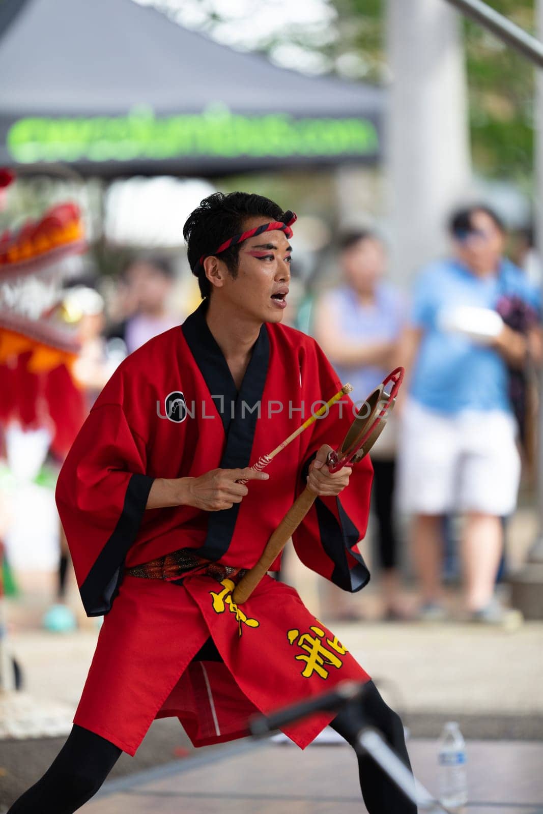 Columbus, Ohio, USA - May 26, 2019: Columbus Asian Festival, Members of Takarabune dance group from Japan, wearing traditional clothing performing traditional dances at the Amphitheater in the Franklin Park.