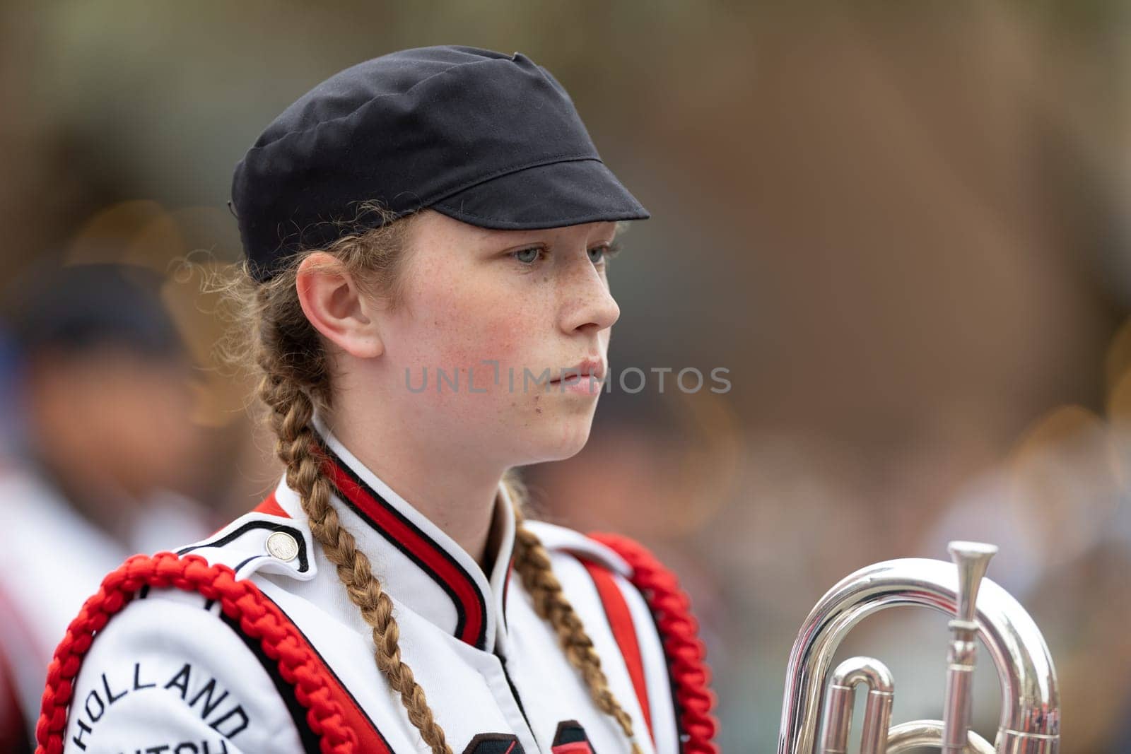 Holland, Michigan, USA - May 11, 2019: Tulip Time Parade, Members of the Holland High School Marching Dutchman Band, performing during the parade