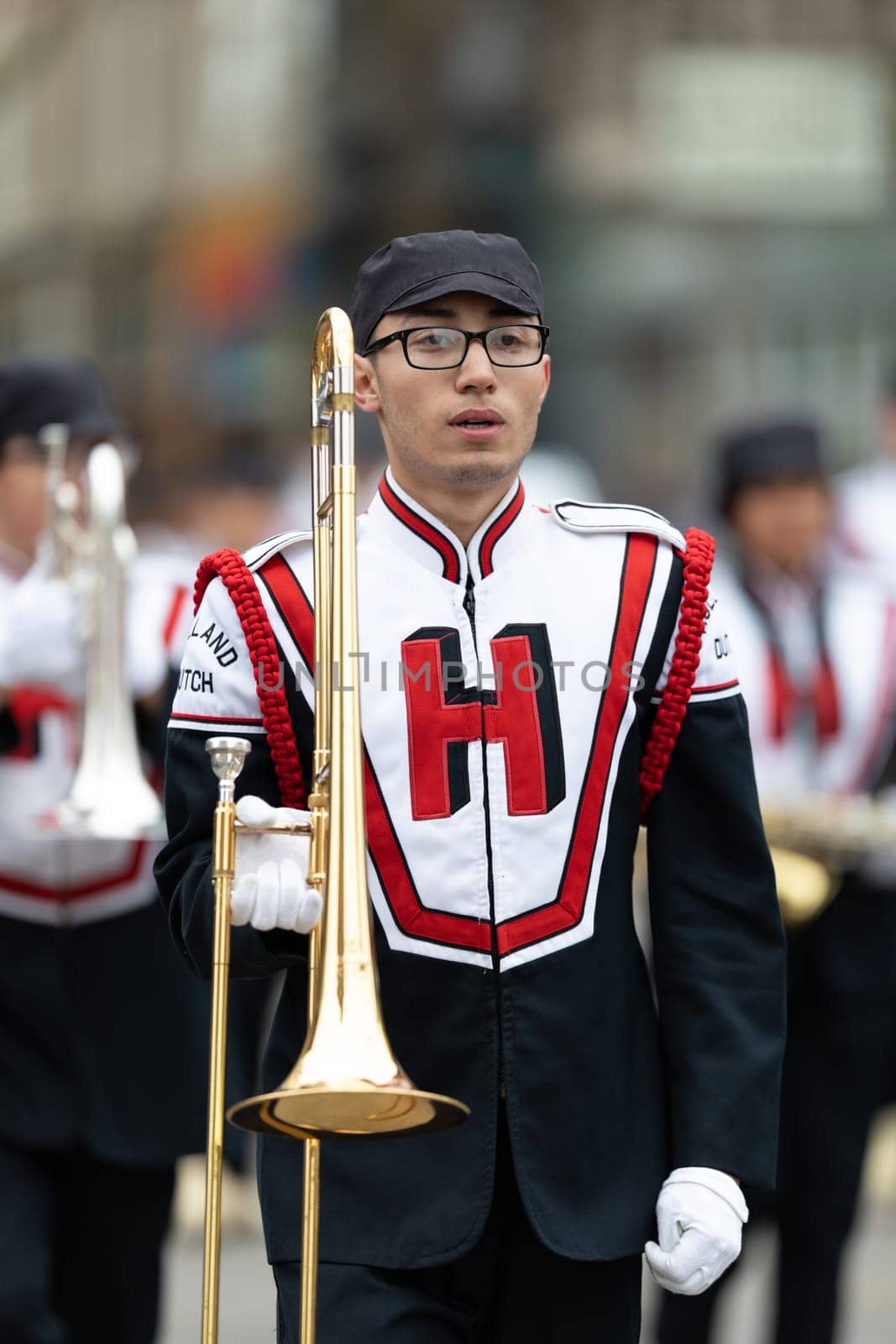 Holland, Michigan, USA - May 11, 2019: Tulip Time Parade, Members of the Holland High School Marching Dutchman Band, performing during the parade