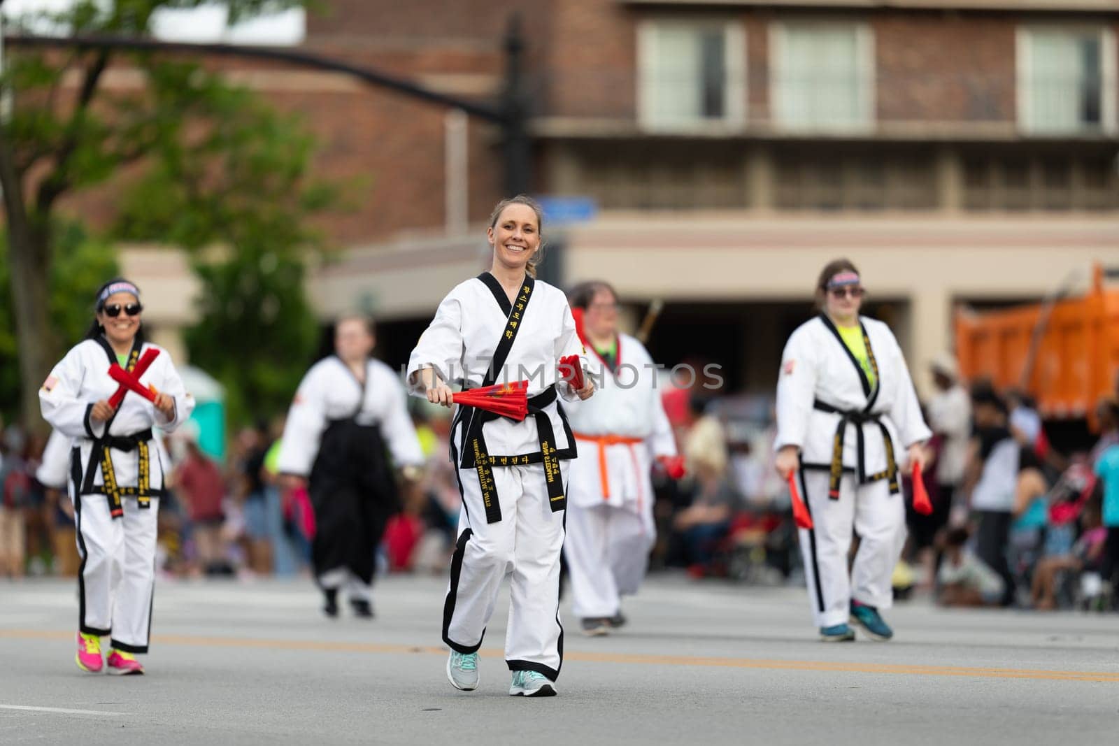 Louisville, Kentucky, USA - May 2, 2019: The Pegasus Parade, Members of the Hwangs Martial Art Program  displaying their martial arts skills