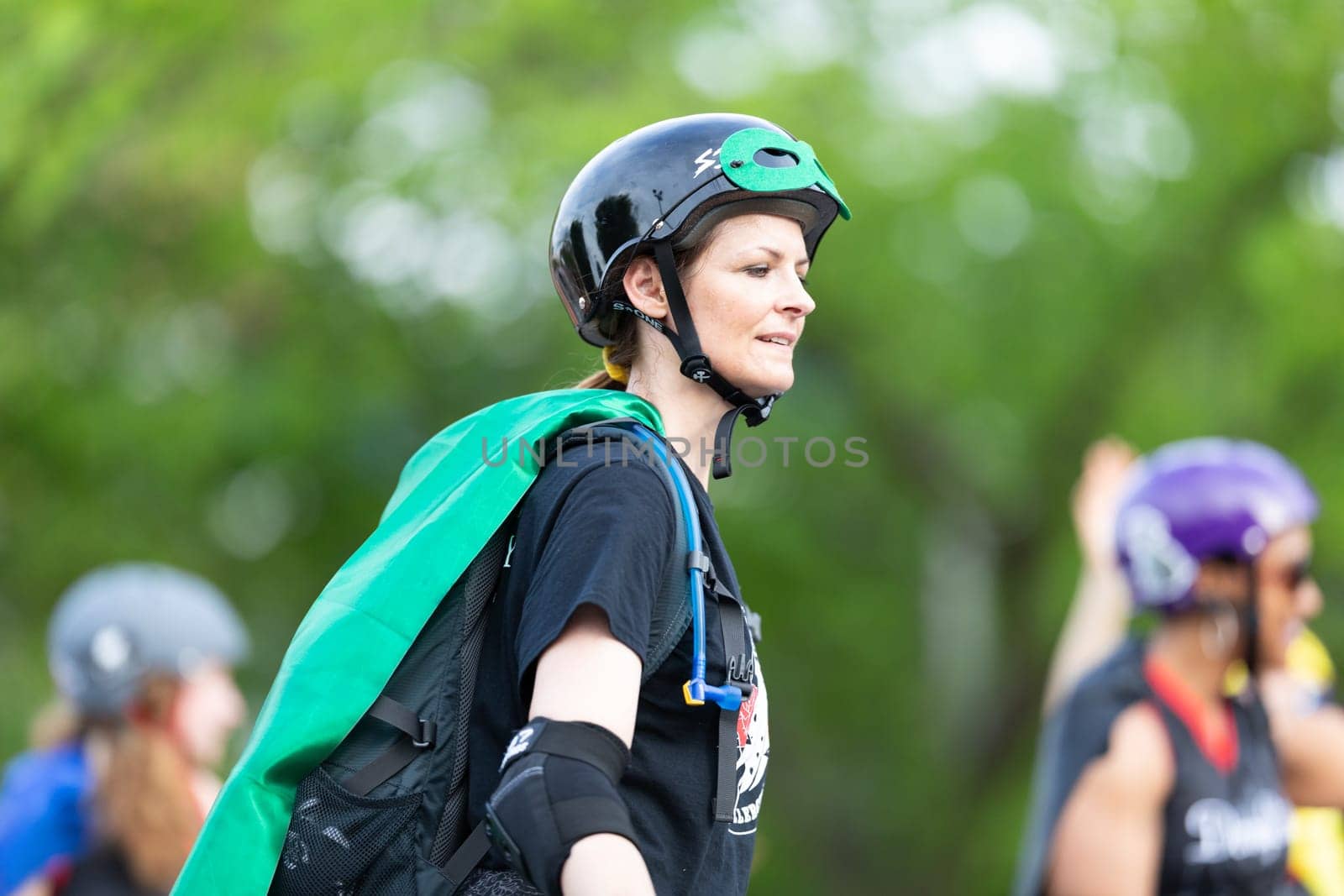 Louisville, Kentucky, USA - May 2, 2019: The Pegasus Parade, The Derby City Roller Girls dress up as duperheroes, skating down the street during the parade