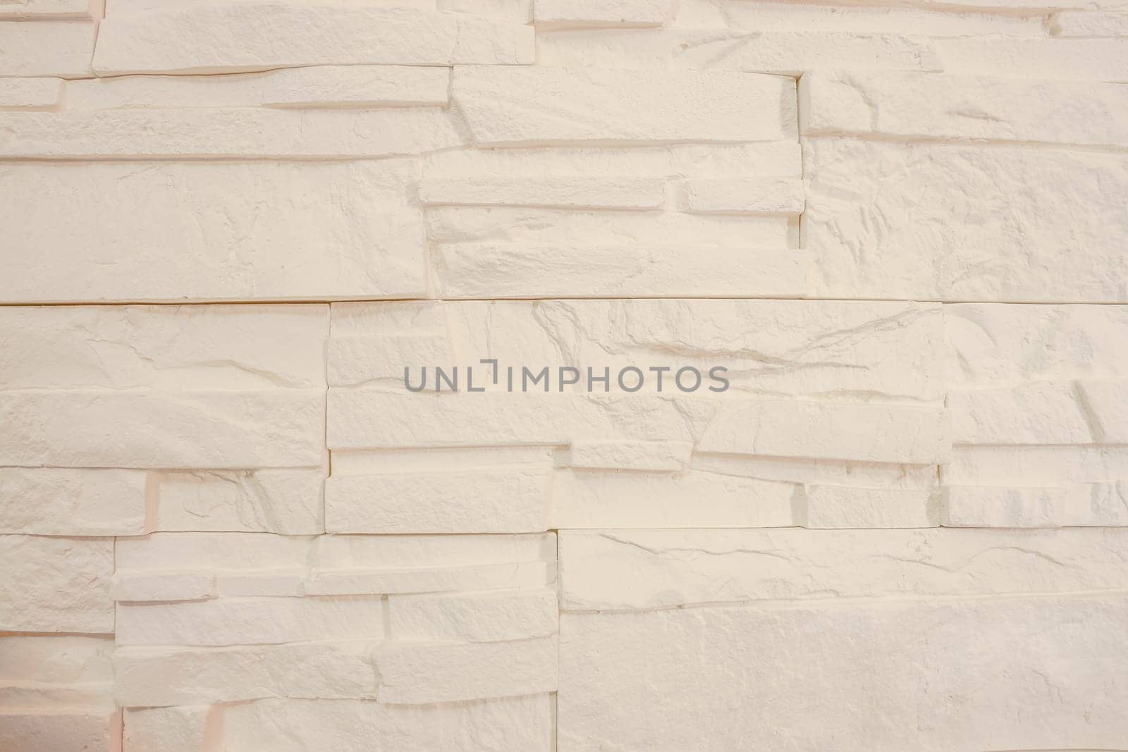 Faux stone wall. Interior decorator. Texture and background