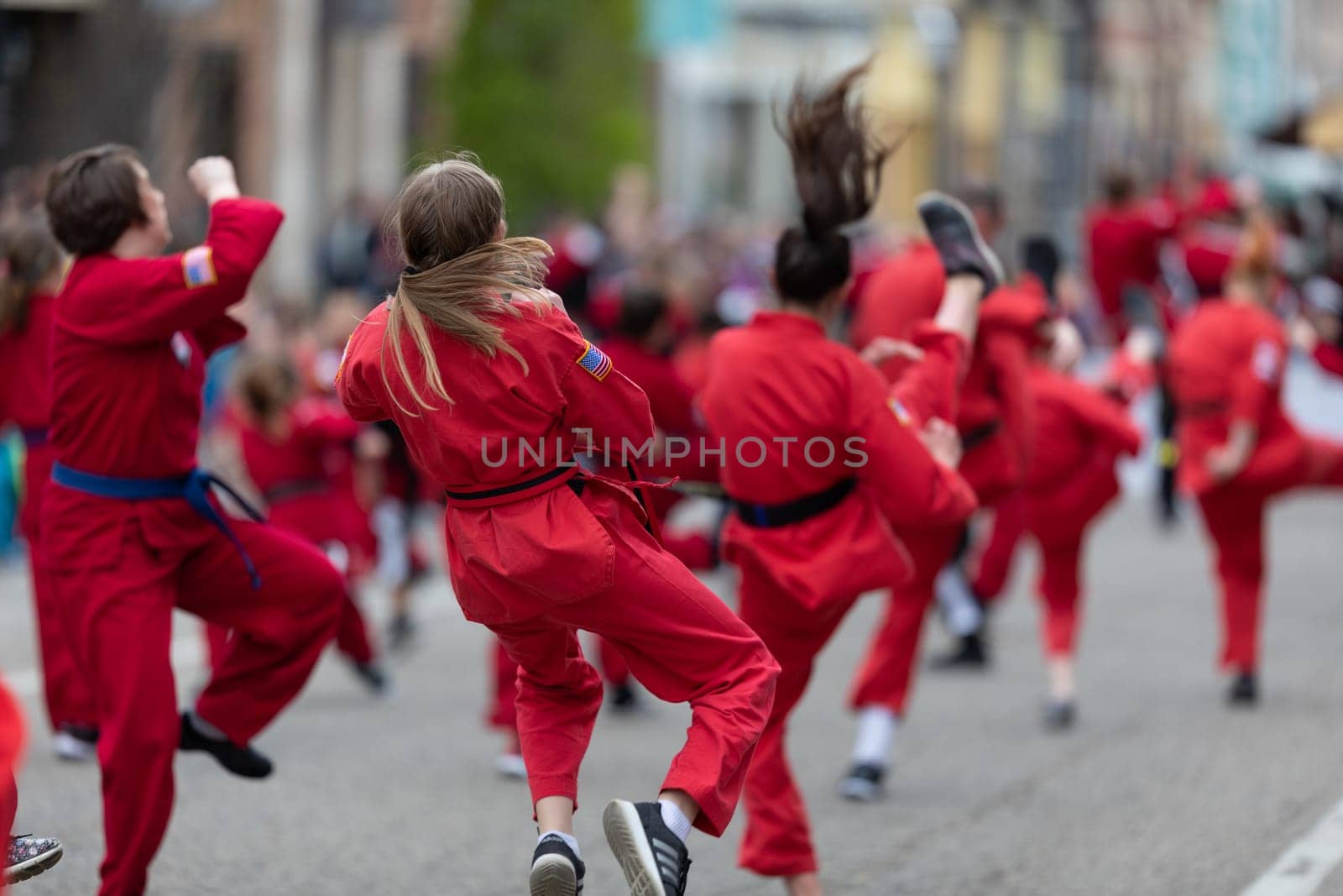 Holland, Michigan, USA - May 11, 2019: Tulip Time Parade, Display by school of martial arts on the street during the parade