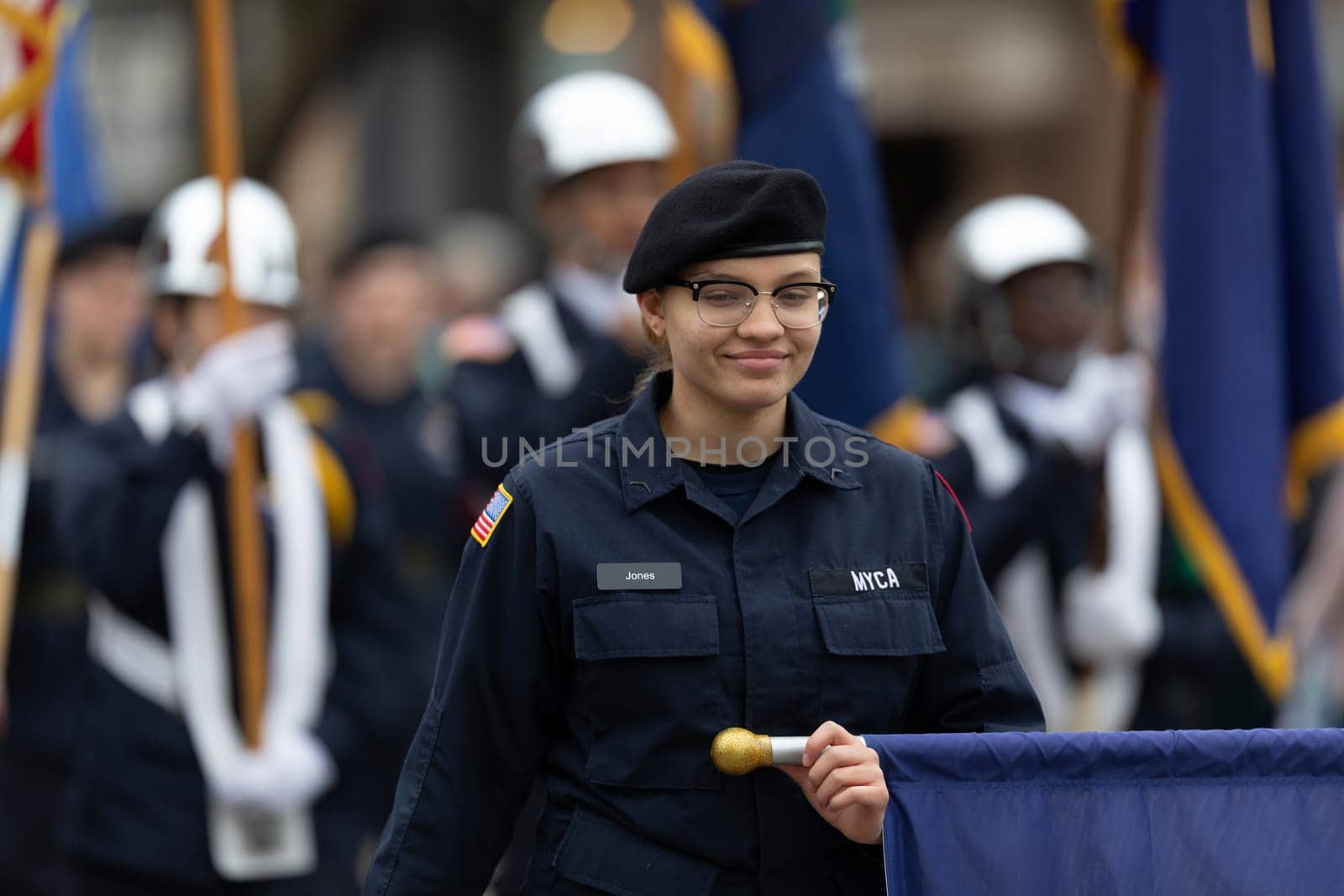 Holland, Michigan, USA - May 11, 2019: Tulip Time Parade, Members of the Michigan Youth Challenge Academy, escorting the American flag during the parade